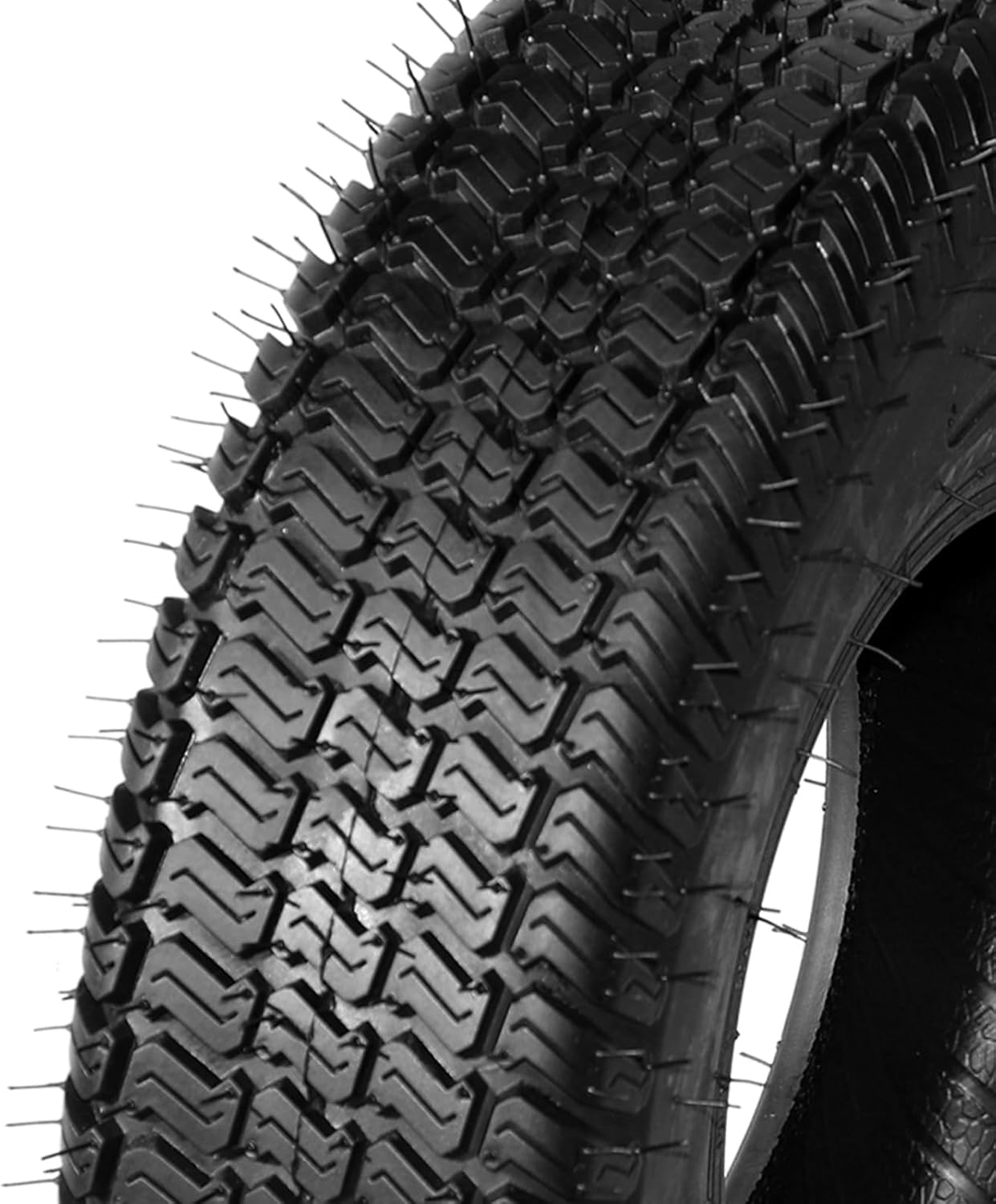 Close-up of a tire sidewall with text 'NOT FOR HIGHWAY SERVICE' clearly visible.