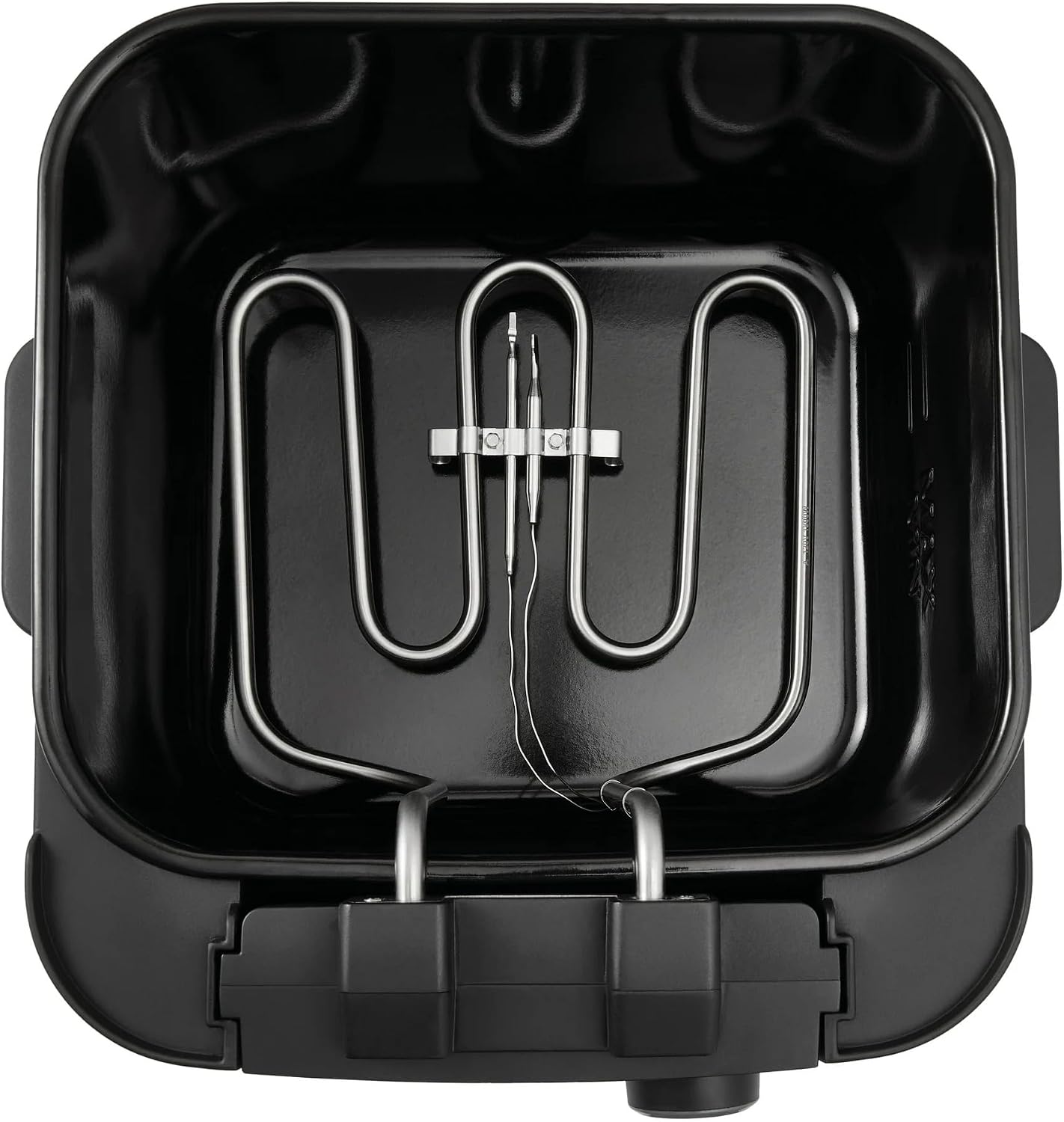 Atas ke bawah view of the Mainstays 4L Deep Fryer's interior, showing the immersion heating element.