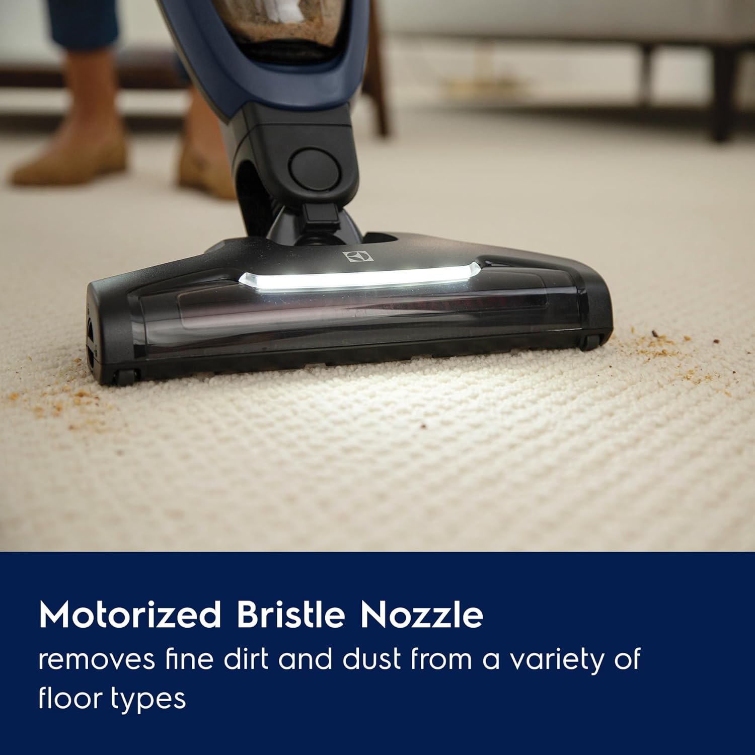 Electrolux WellQ7 motorized bristle nozzle with LED lights cleaning a carpet