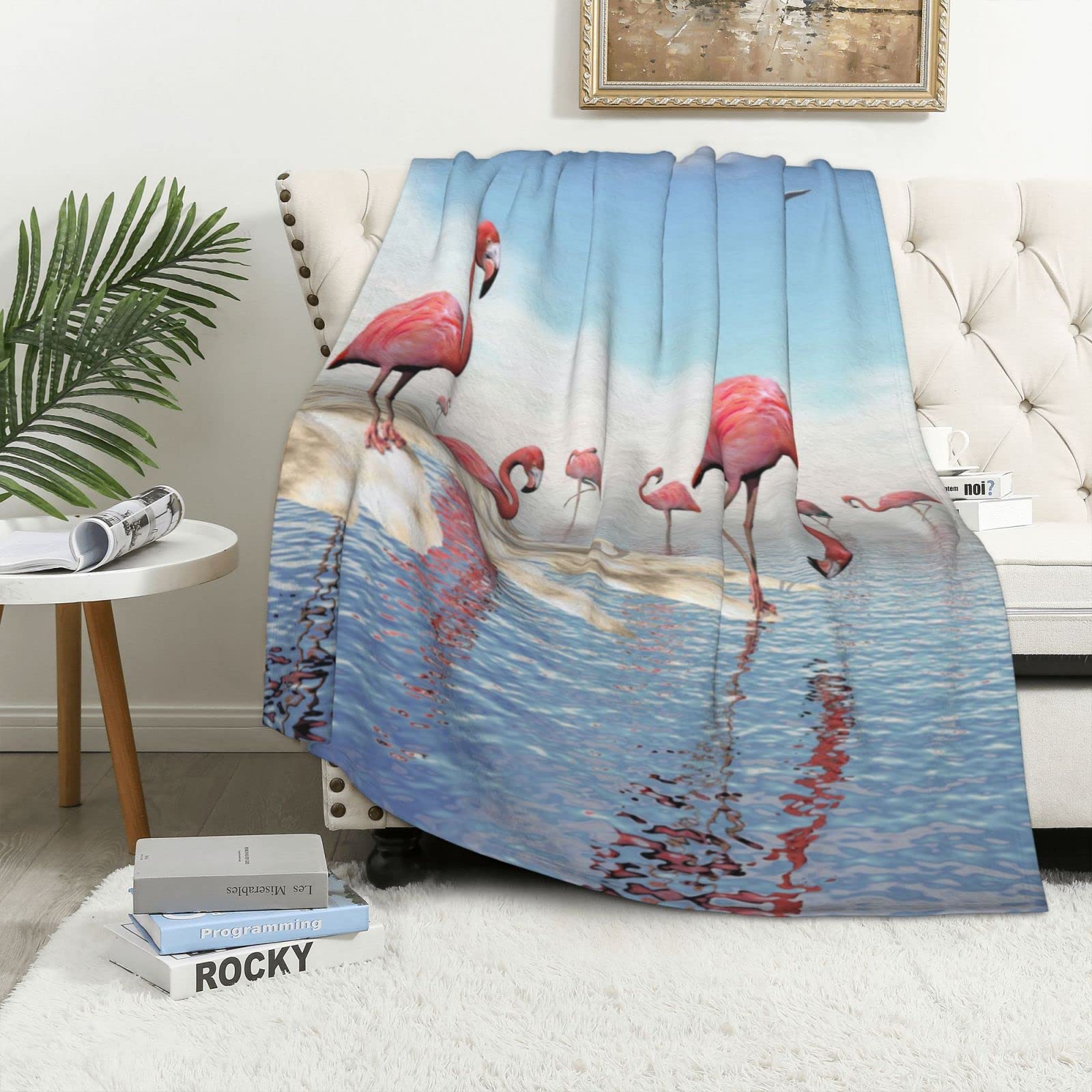Plaid flamants roses pour des soirées cocooning douillettes sur le canapé