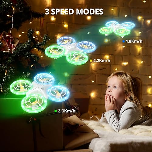 Miniatura 7 de TOMZON Drone A34 para niños con luces LED verdes y azules, Drone RC para niños con retención de altitud, giro 3D, modo sin cabeza y 3 velocidades,