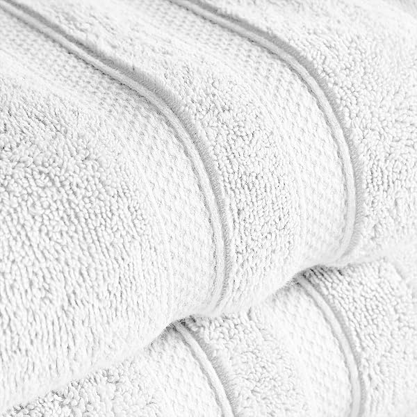 Christy Christy Chroma Bath Towels | Set of 2 | Highly Absorbent Heavyweight 675GSM | Bold and Bright | Soft Velvety Smooth Bathroom Shower Towels | 100% Cotton | Sustainably Made | White in use