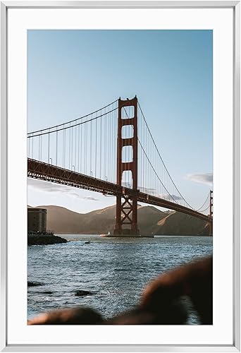 Vista 255 de Frametory - Colección de marcos de metal para fotos, marco de aluminio para fotos con alfombrilla de color marfil y cristal real Dorado