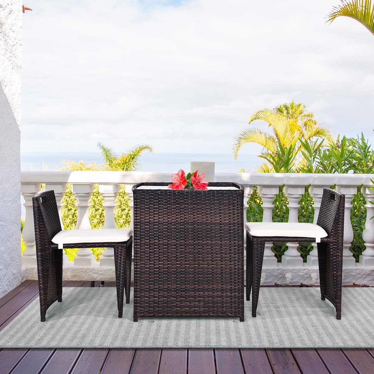 Compact Brown Wicker Outdoor Patio Set with Cushions and Glass Table