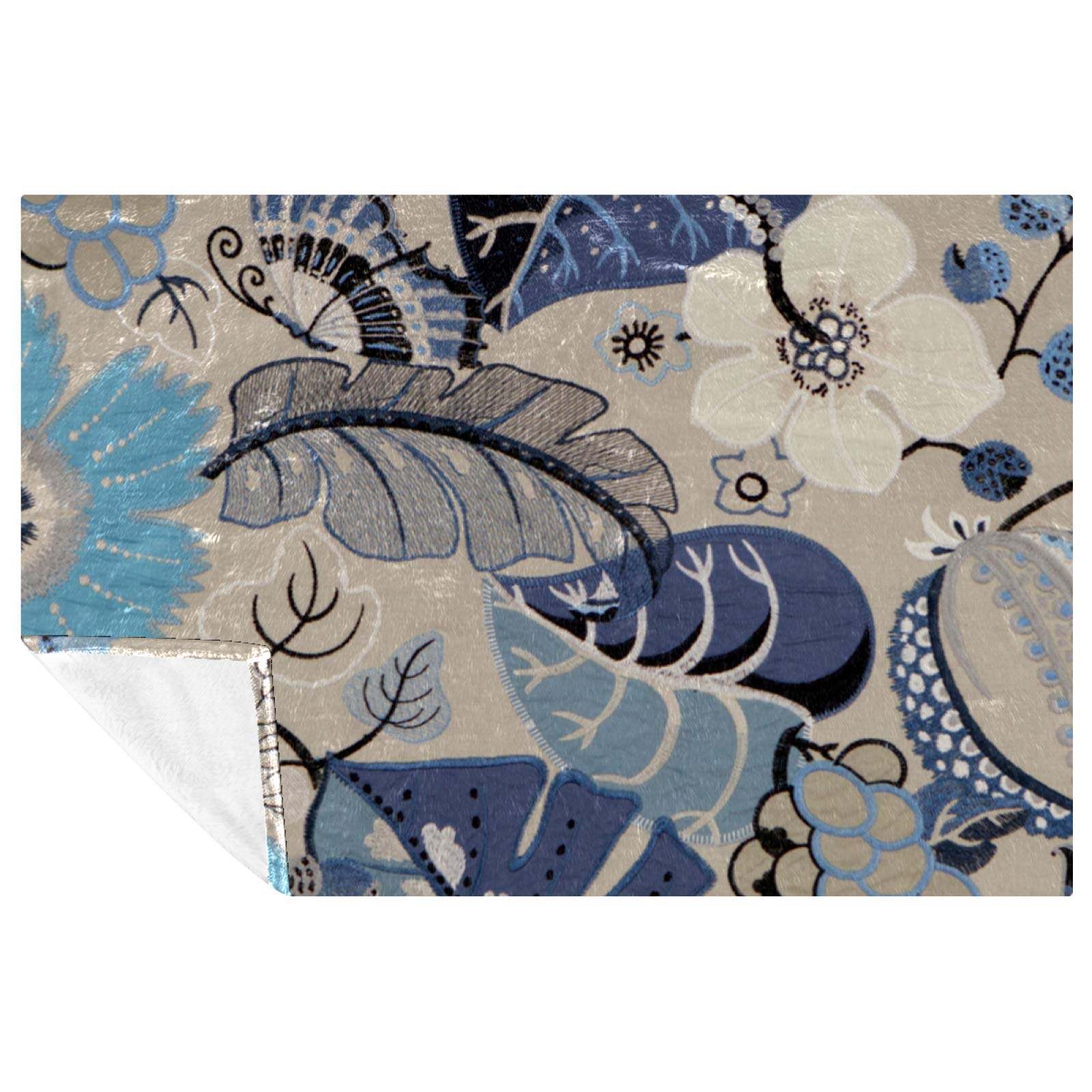 Couverture douce fleurs et papillons pour des moments cocooning