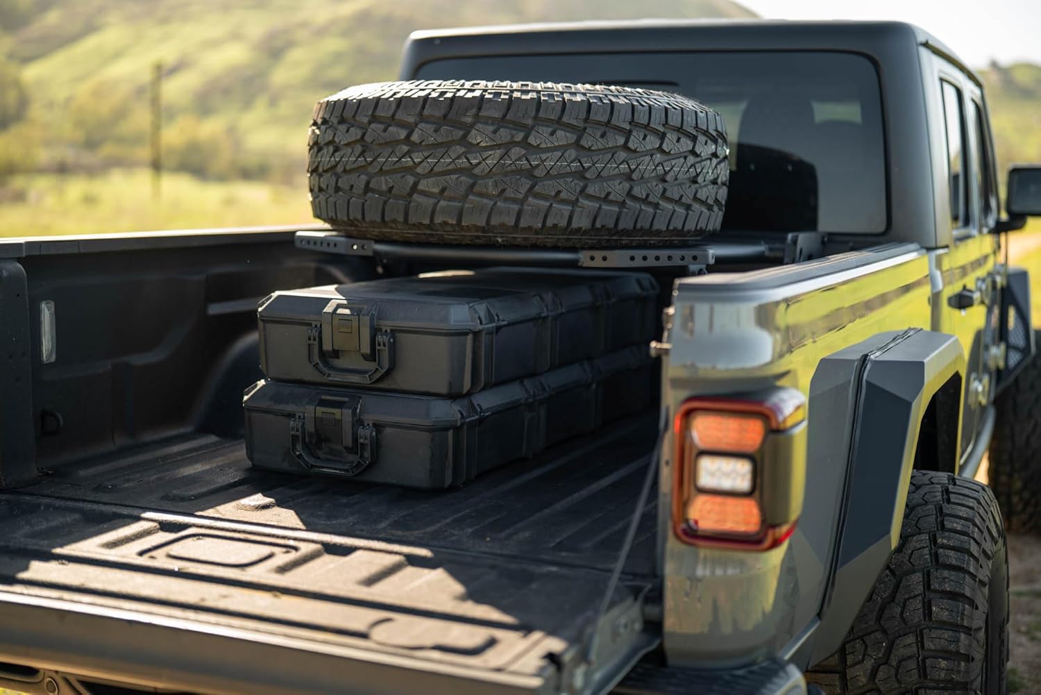 DV8 Offroad Adjustable in-Bed Spare Tire Carrier for 2020-2025 Jeep Gladiator JT | Flat or Angled Mounting Positions | Stainless Single Action Latching Mechanism | Compatible w/Most Wheel/Tire Setups