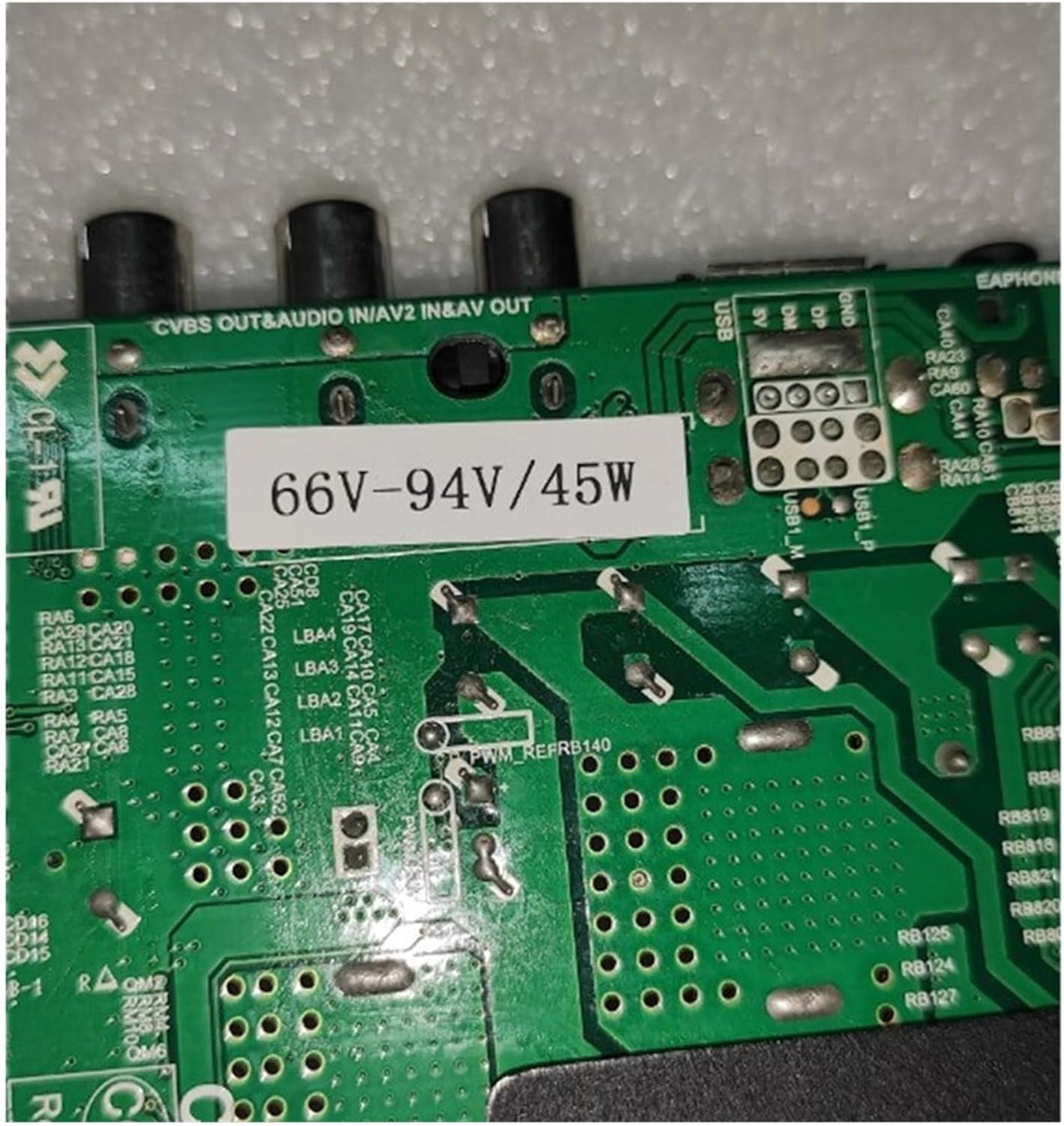 Close-up of motherboard showing TP.V56.PB726 model number