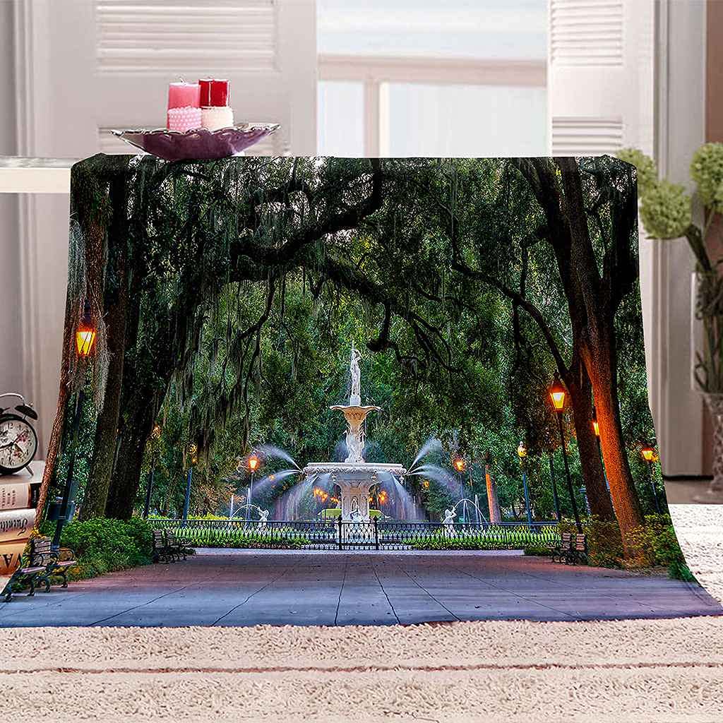 Couverture polaire imprimé fontaine en bois vert pour décorer votre salon et vos soirées cocooning