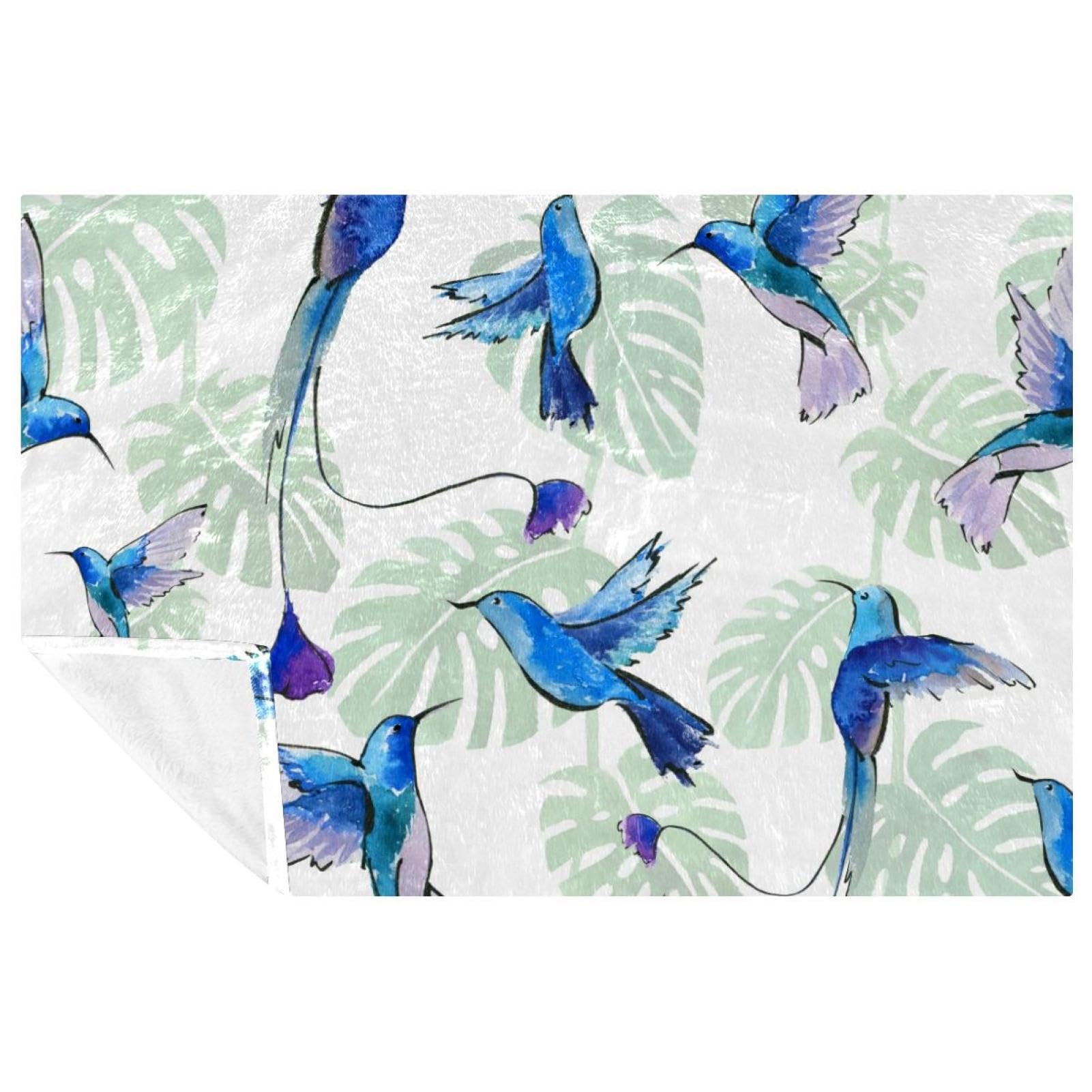 Couverture colibri chaude contre le froid sur votre canapé ou lit