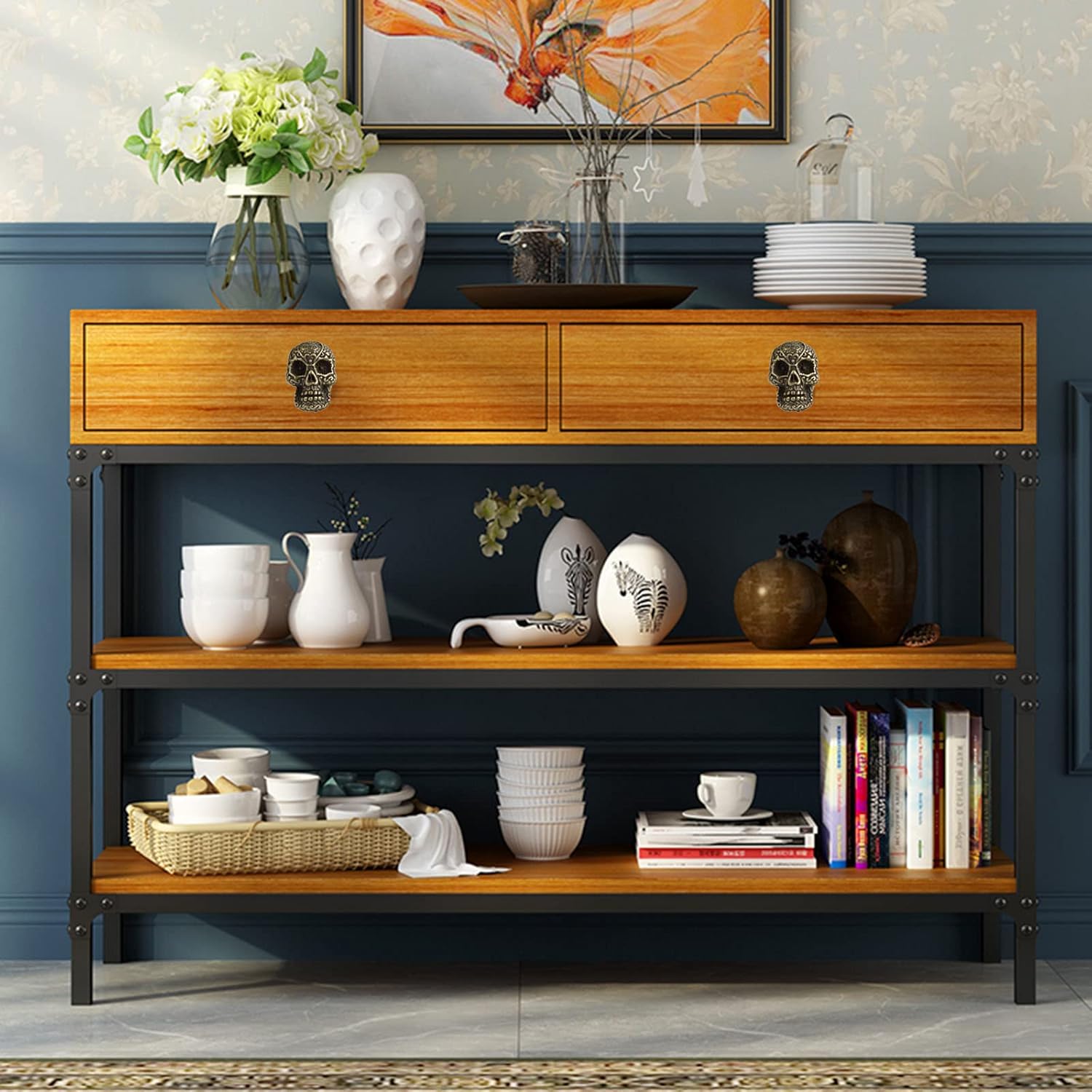 Image showing skull cabinet knobs installed on a wooden dresser with multiple drawers.