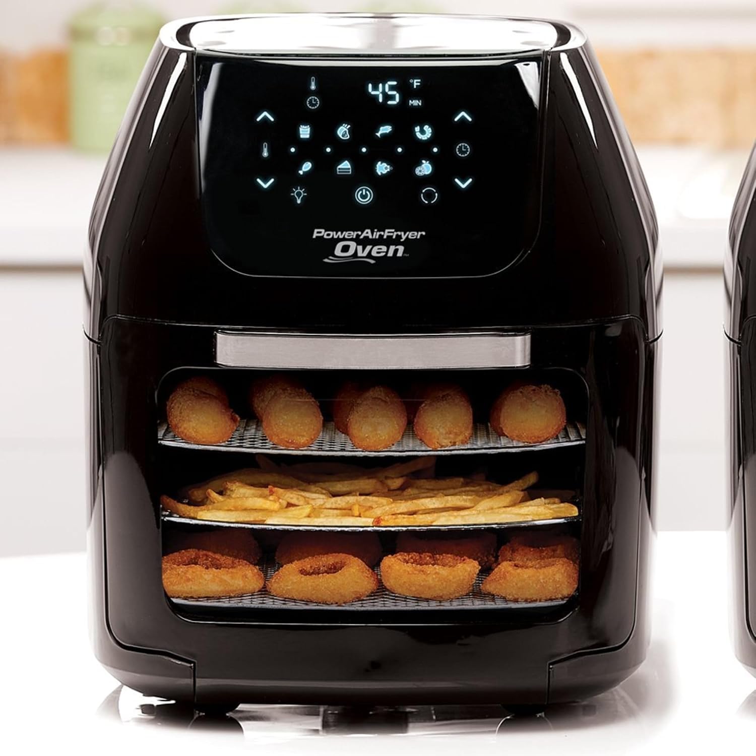 Power Air Fryer Oven cooking french fries and onion rings on multiple racks