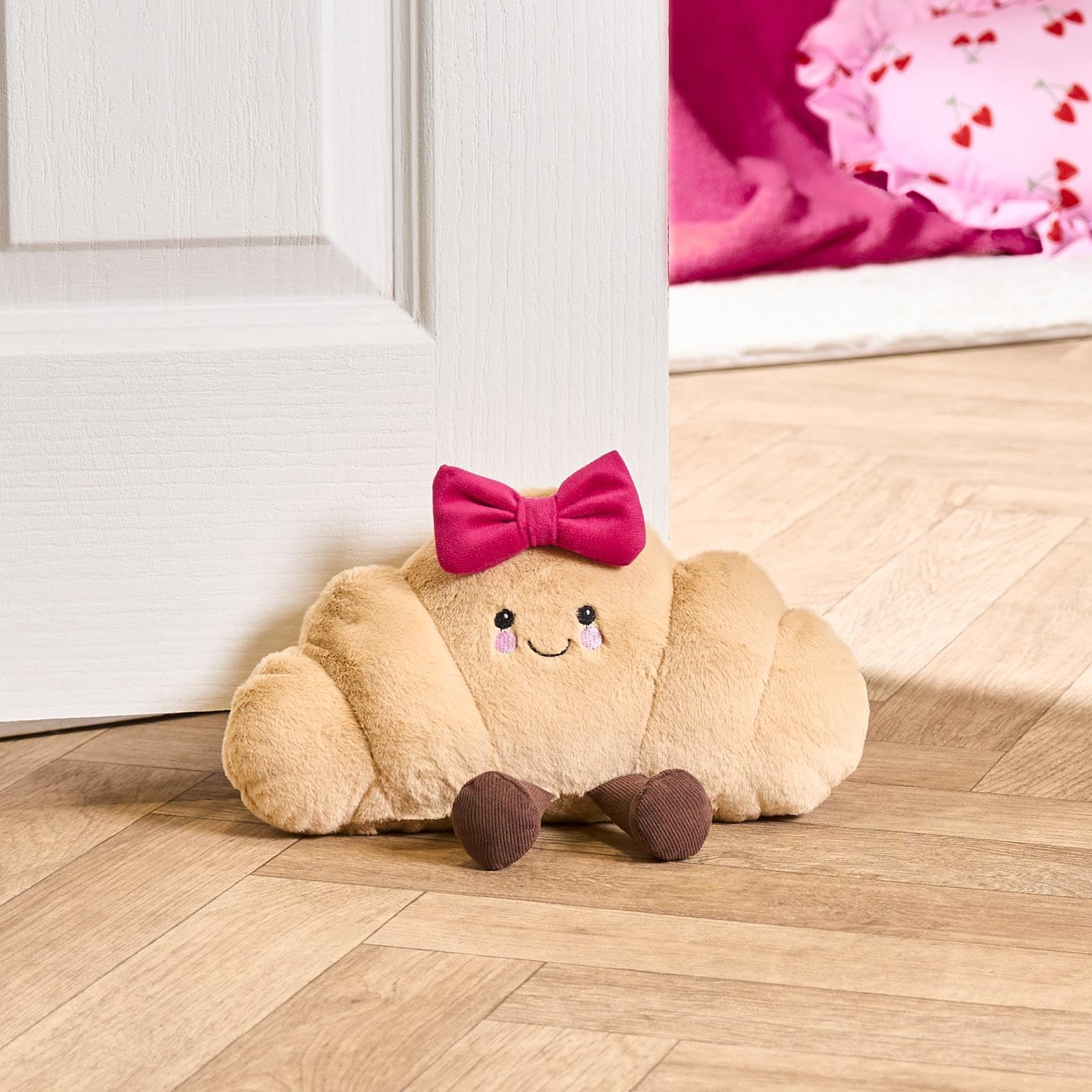 Ohs Bow Croissant Character Novelty Fleece Decorative Weighted Doorstop from B&Q