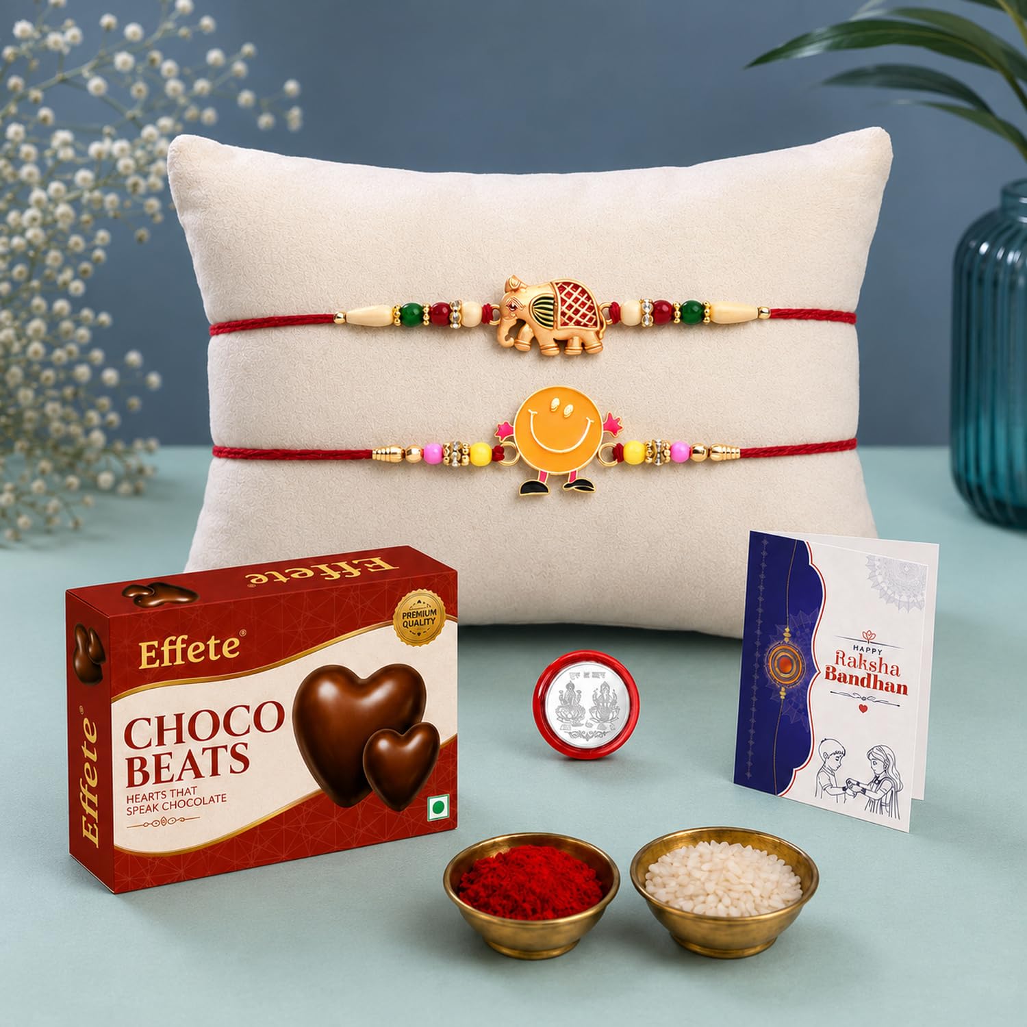 Oblivion Kids Rakhi Set of 2 for Brother – Elephant & Smiley Face Design with Choco Beats Chocolate 32gm, Pooja Coin, Roli Chawal & Card | Rakhi with Chocolate Combo for Raksha Bandhan