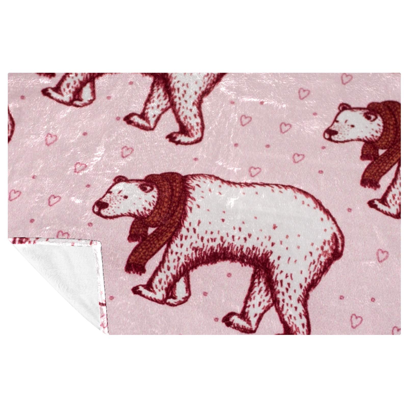 Couverture ours polaire douce rouge pour des moments cocooning