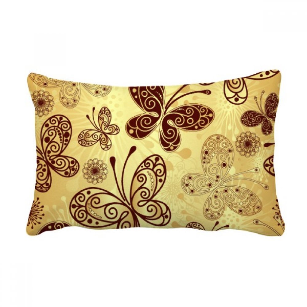 Coussin lombaire papillon jaune pour soulager le dos sur le canapé du salon