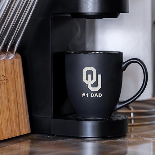 Miniatura 45 de Rico Industries NCAA #1 Dad - Taza bistró de cerámica negra mate grabada con láser, de 15 onzas, para bebidas calientes o frías Troyanos del Sur
