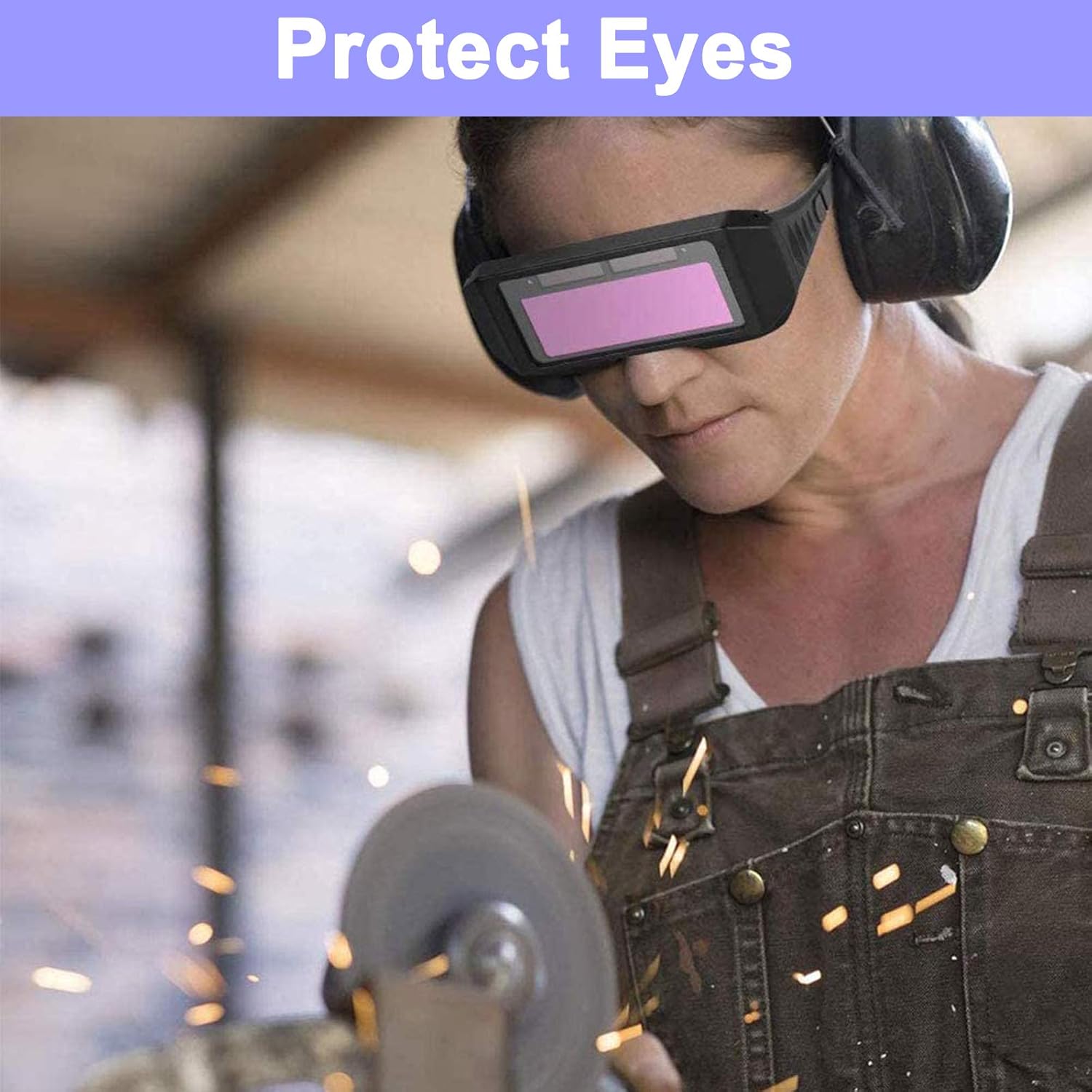 Woman wearing solar darkening welding glasses