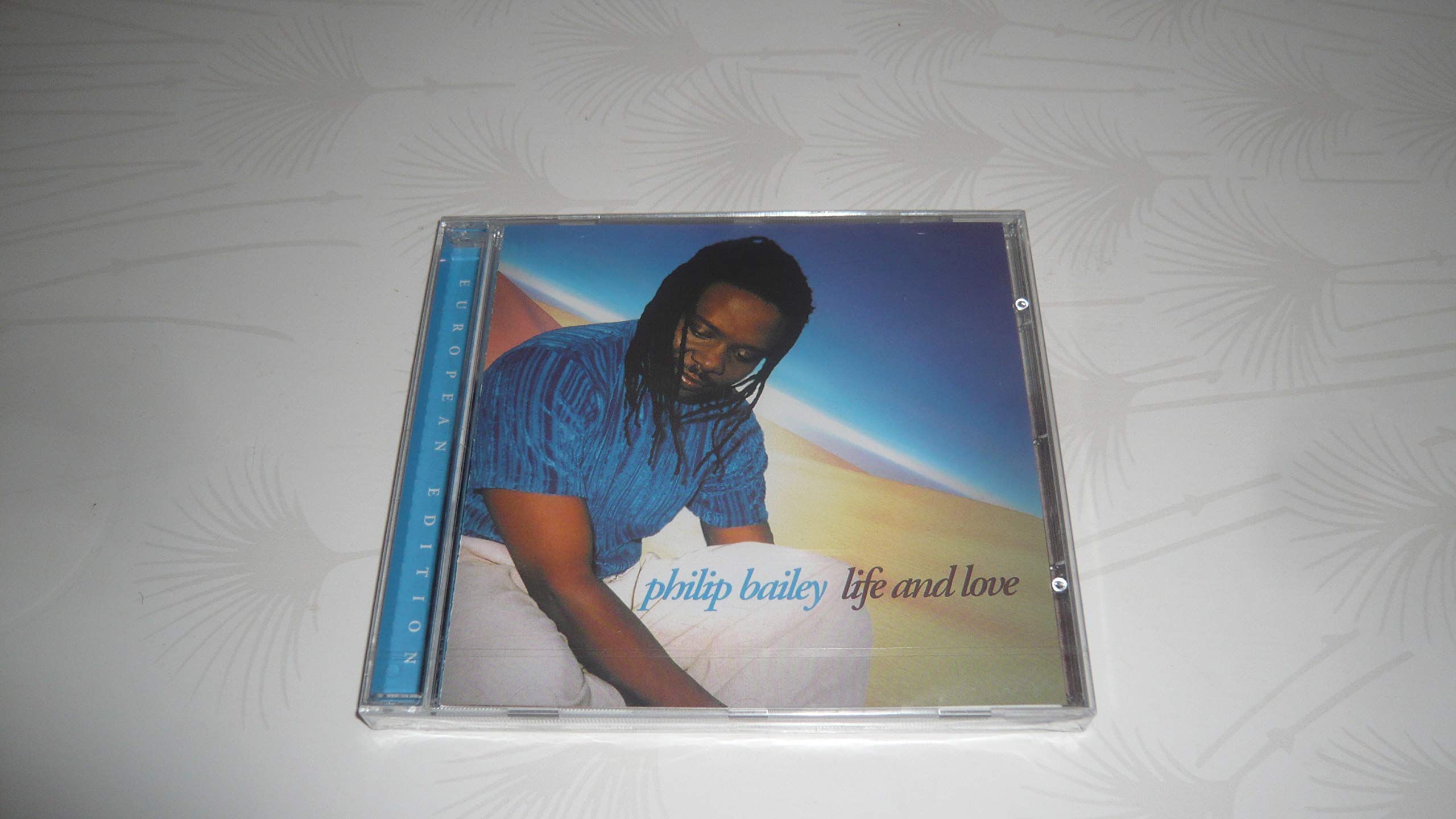 Life and Love [Audio CD] Philip Bailey; Rafael Padilla; Ed Jones; Andrew Klippel; Kevin Chokan; Graham Harvey; Greg "Gigi" Gonaway; Howard McCrary; Tata Vega; Chris DeMargary; Vernon Black and Myron Dove
