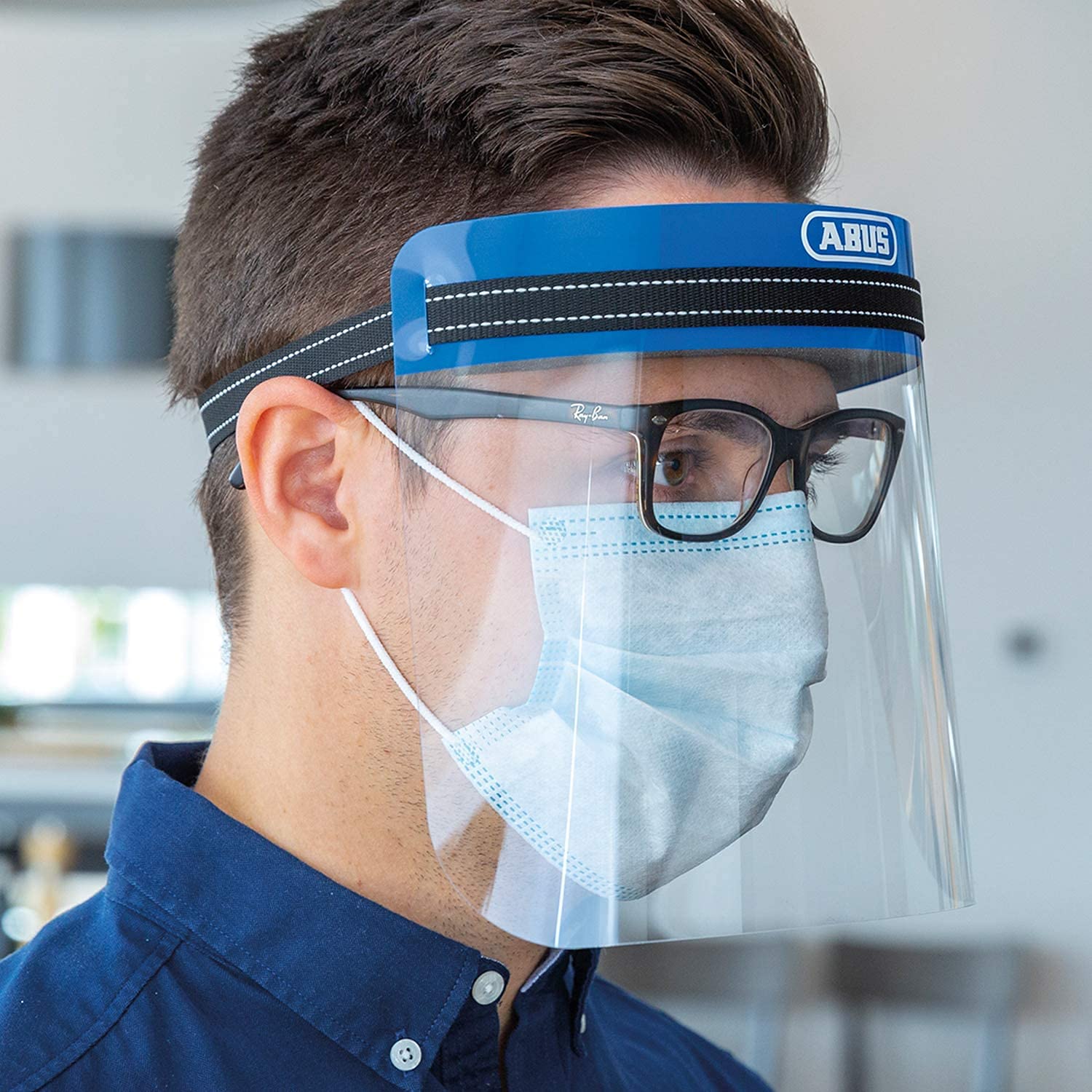 ABUS Face Guard - Protector facial con visera ancha de cristal acrílico, certificado EN 166, lavable, apto para personas con gafas, juego de 100 unidades, color azul, talla única