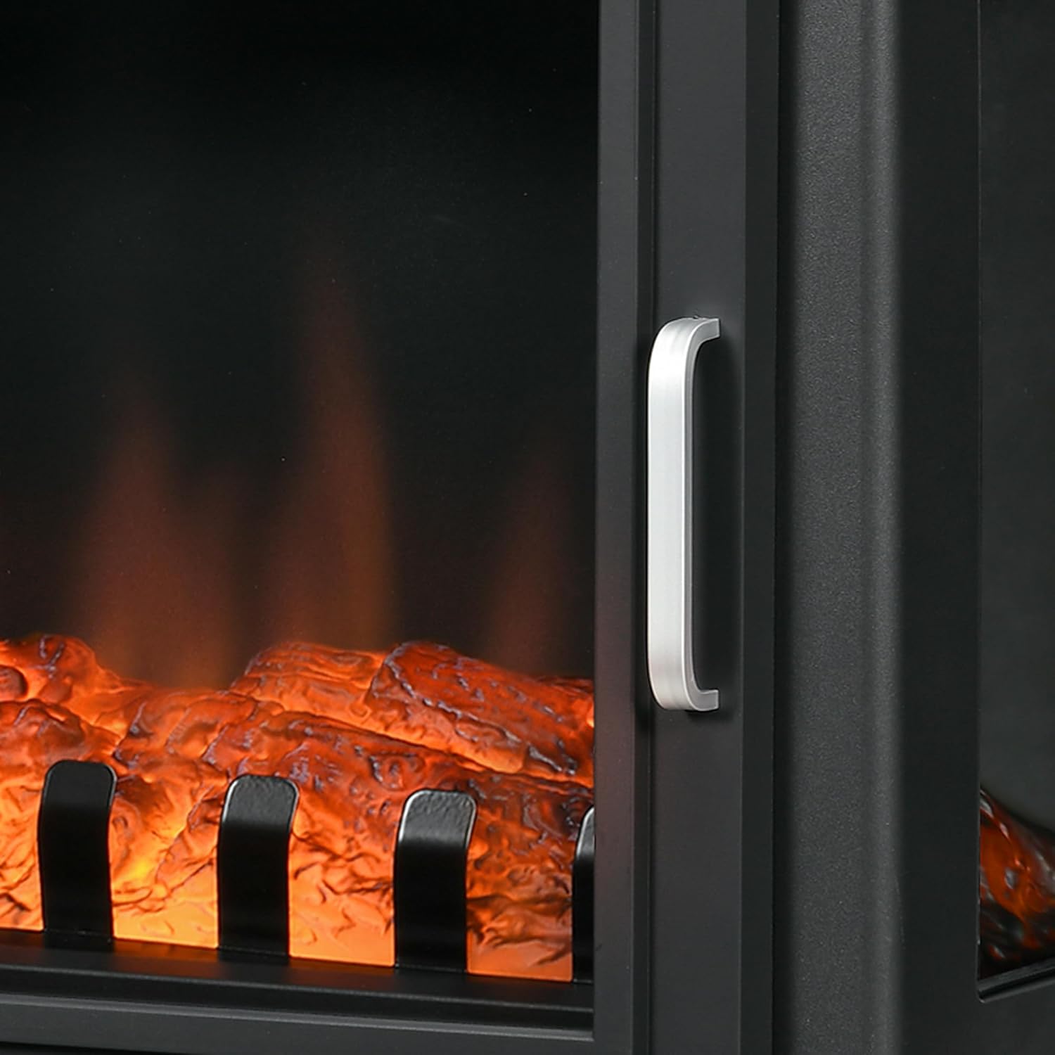 Close-up of the decorative handle on the electric fireplace stove door