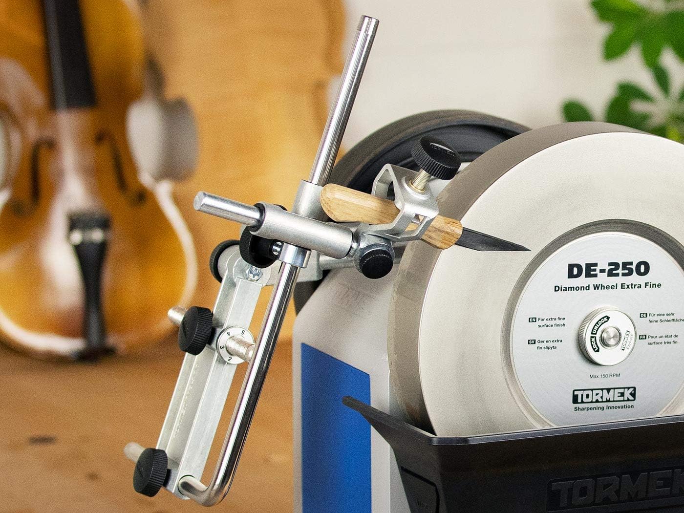 Tormek SVD-186 R Gouge Jig mounted on a sharpening system with a tool