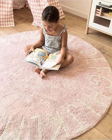 round pink rug for nursery