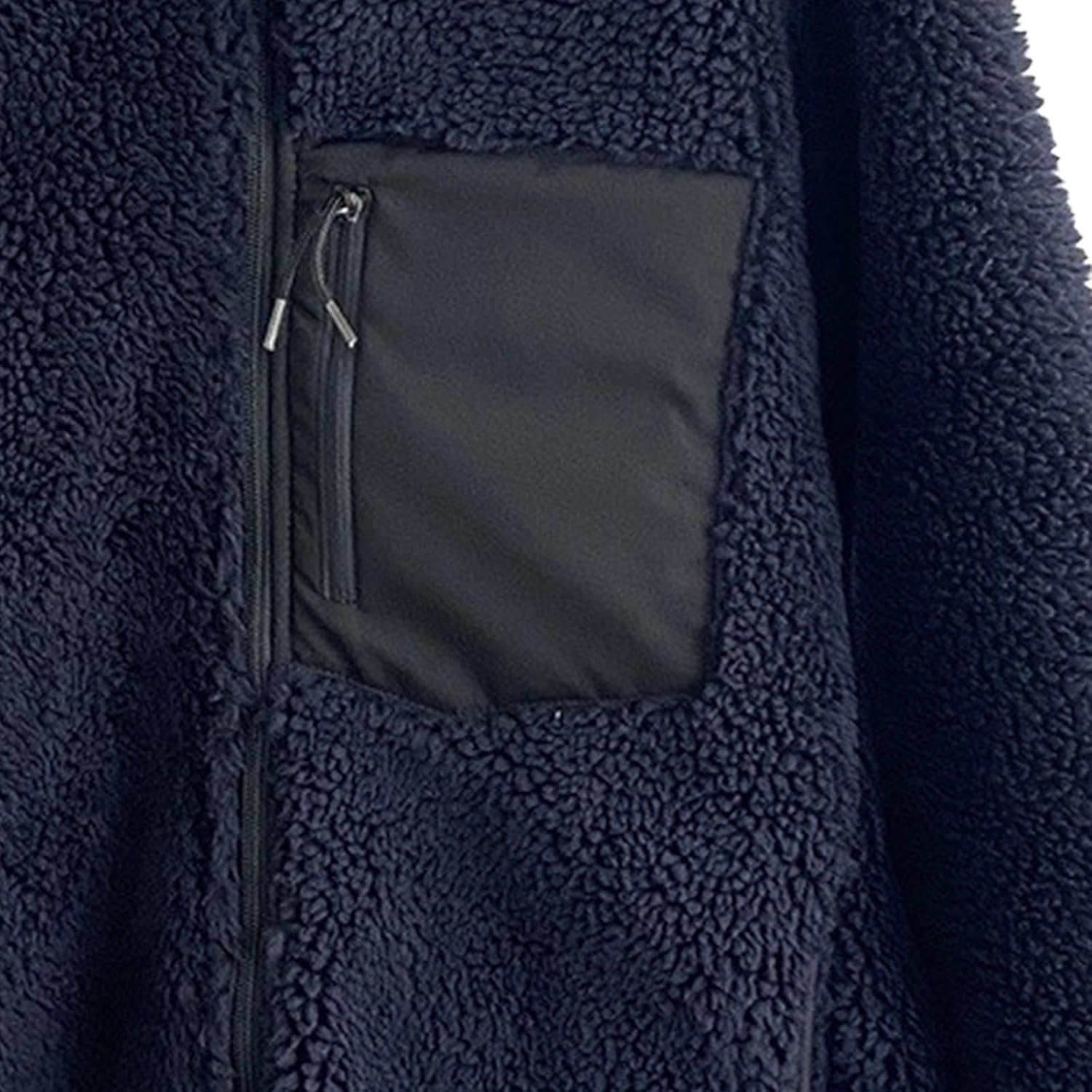 Close-up of a Navy Blue Faux Fleece Jacket Pocket