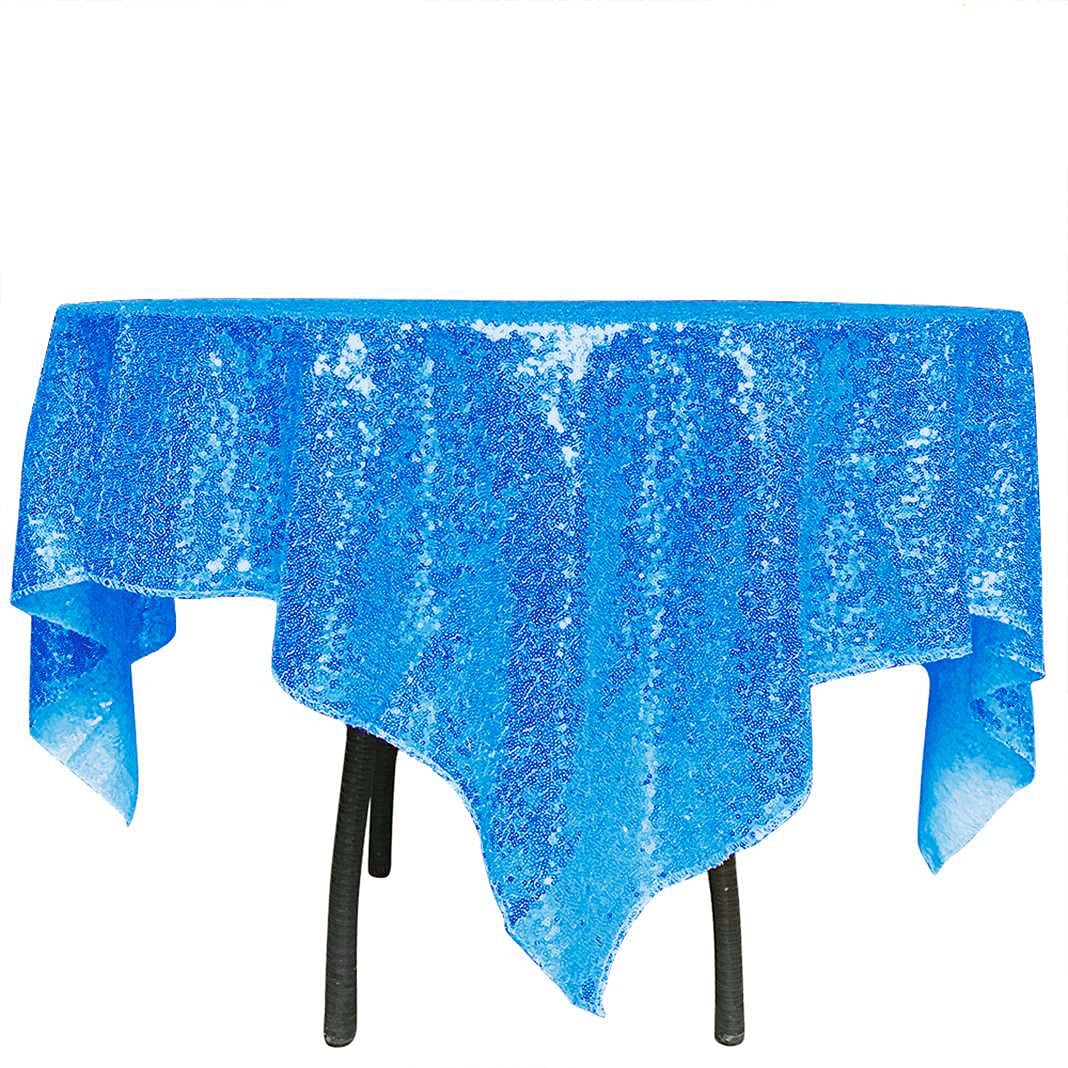 Nappe rectangulaire à paillettes bleu layette pour habiller une table de réveillon