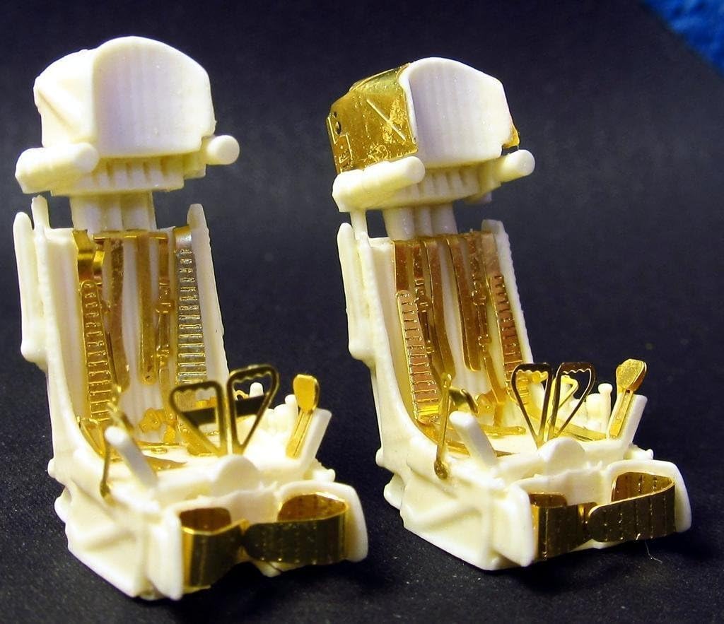 Two assembled ejection seats side-by-side
