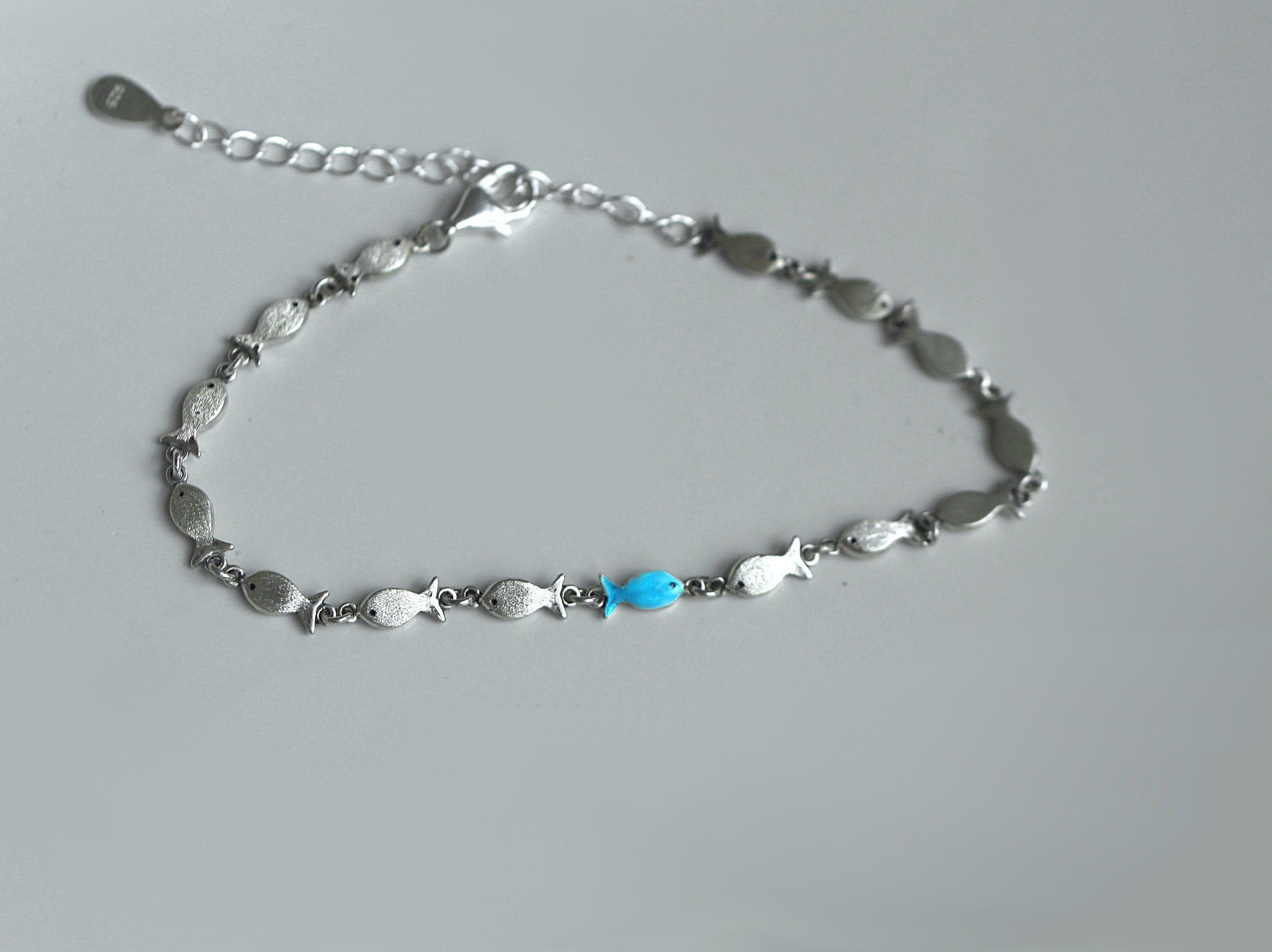 Generisch Silberarmband GEGEN DEN STROM. 925 Silber und Türkis Blau