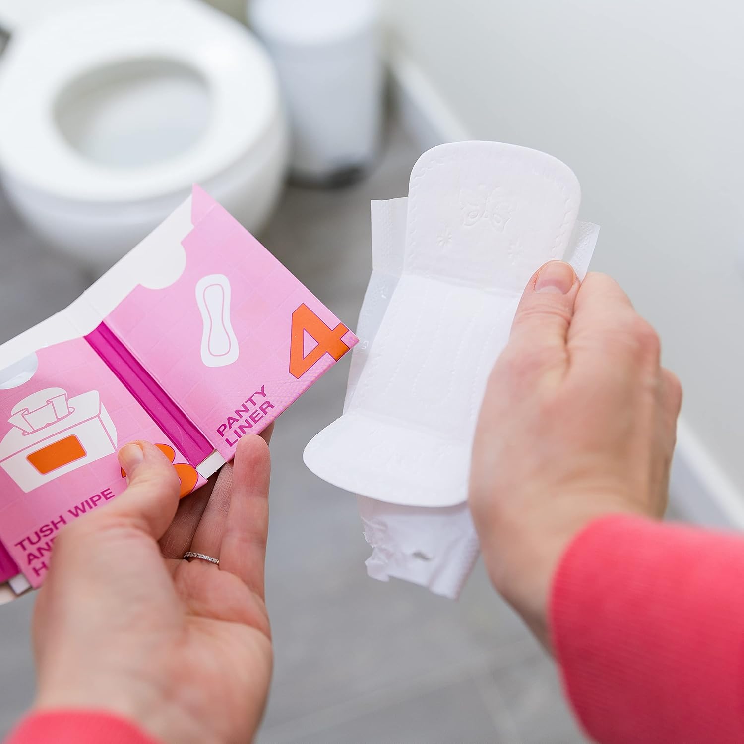 The Restroom Kit Plus: All-in-One Hygiene Travel Kit for Women, 12-Pack with Panty Liner, Patented Seat Cover, 3-Ply Toilet Paper, and Wipes