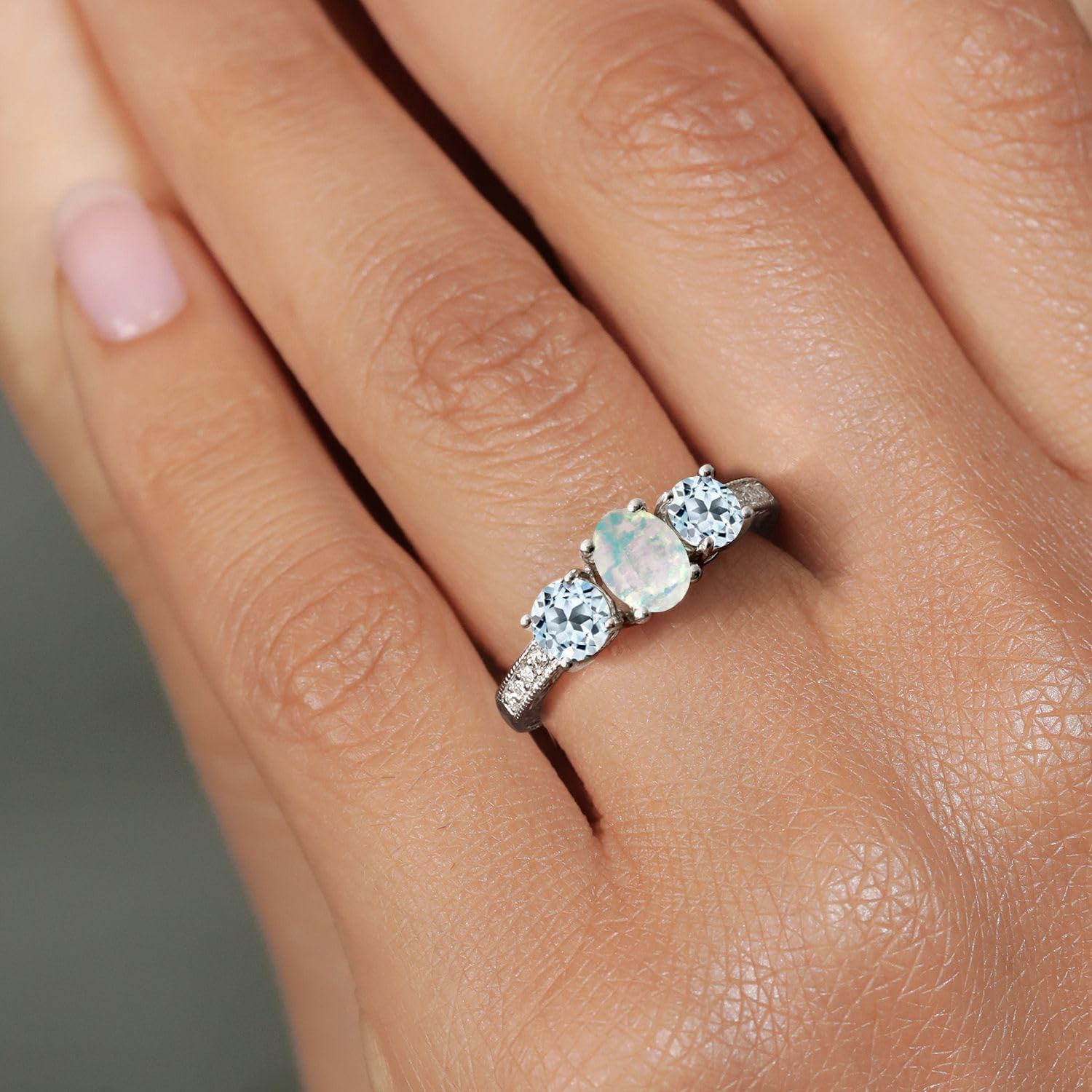 Gem Stone King 925 Sterling Silver White Simulated Opal and Sky Blue Topaz Ring For Women (1.75 Cttw, Oval Gemstone Birthstone)