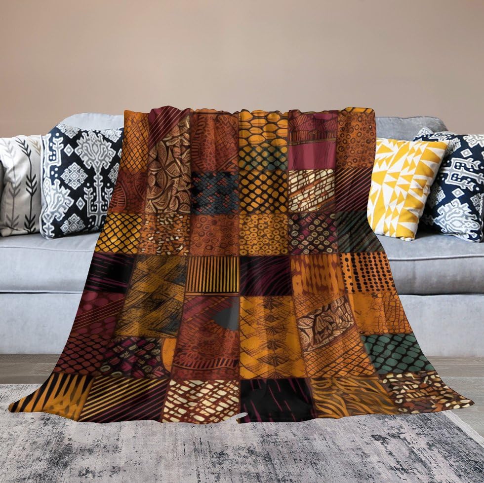 Couverture micro polaire patchwork pour cocooning sur le canapé du salon en été