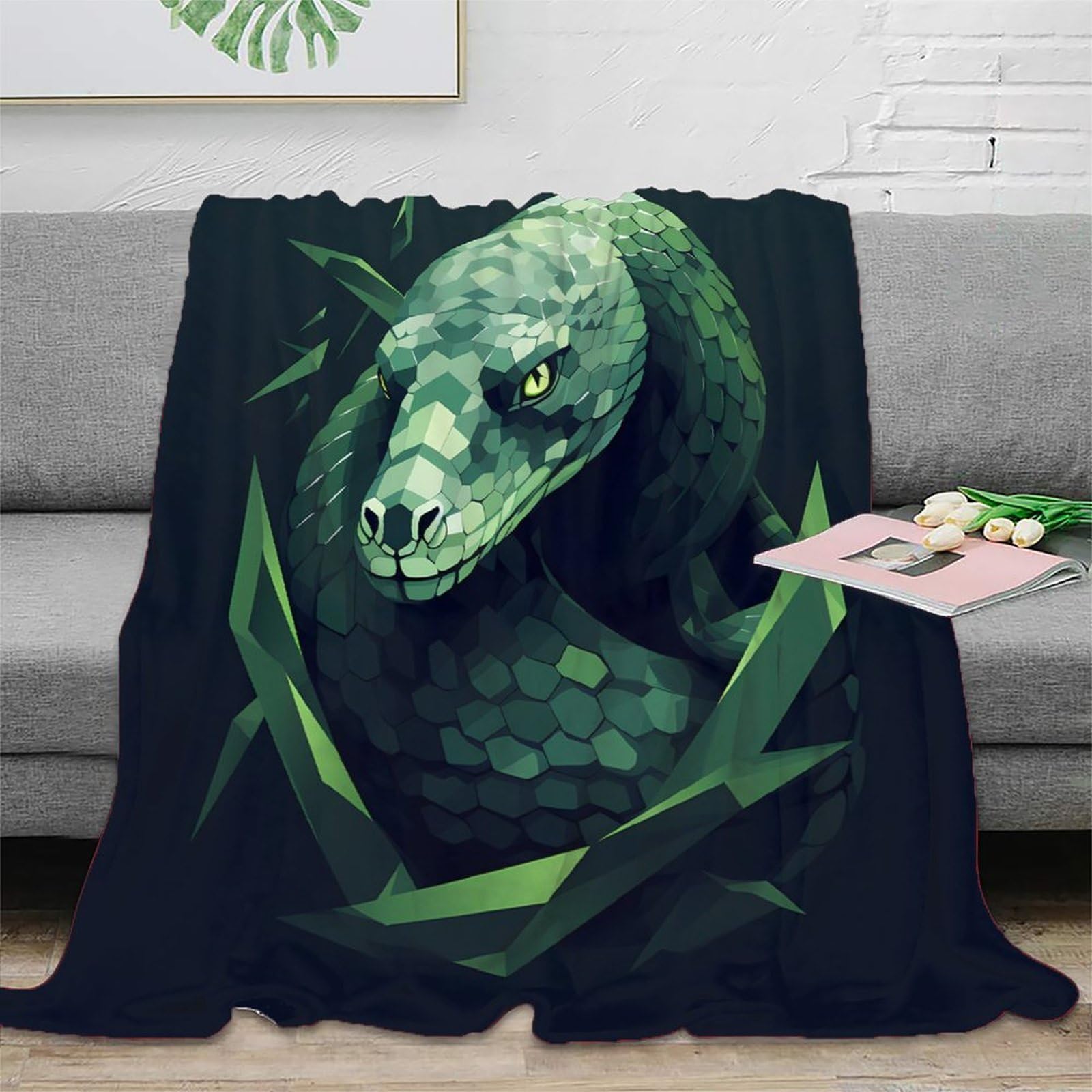 Plaid serpent 3D pour masquer un vieux canapé et réchauffer les soirées d'hiver
