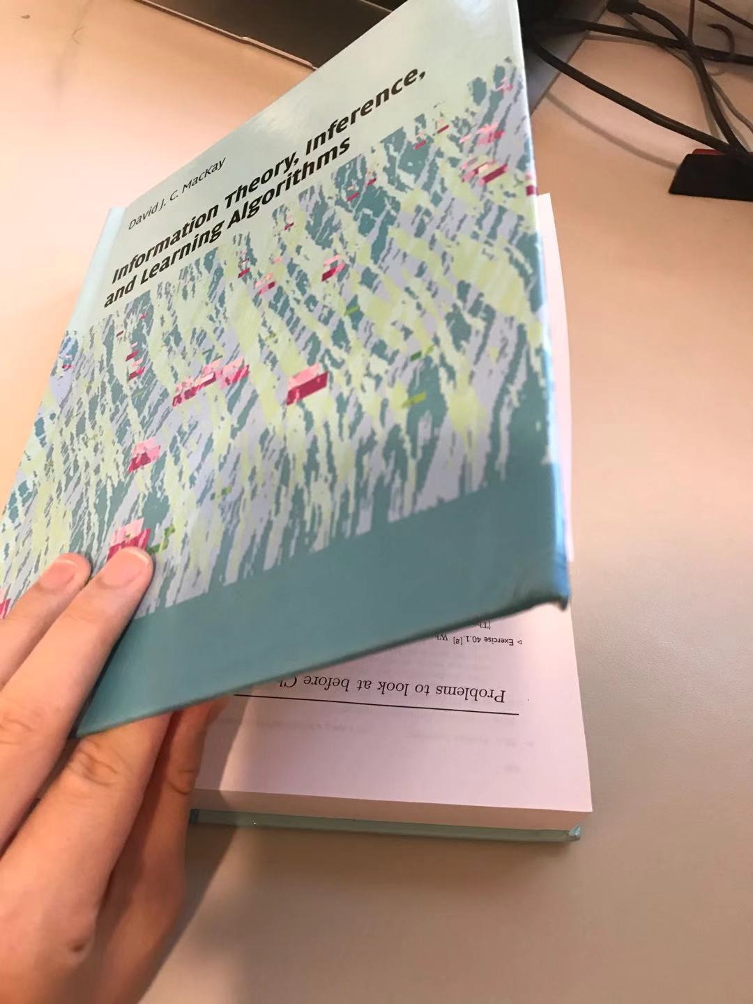 The book cover is upside down