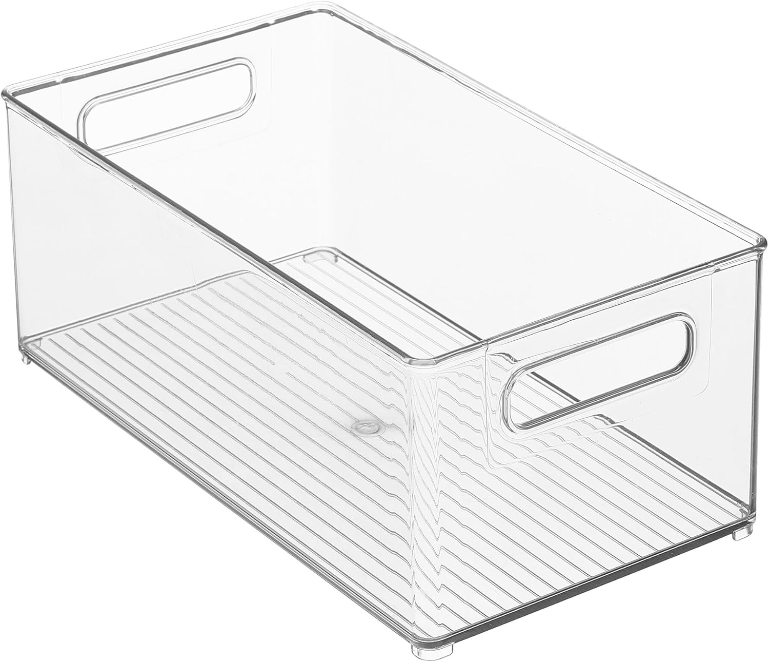 A clear mDesign storage bin filled with boxes of food, placed in a refrigerator drawer.