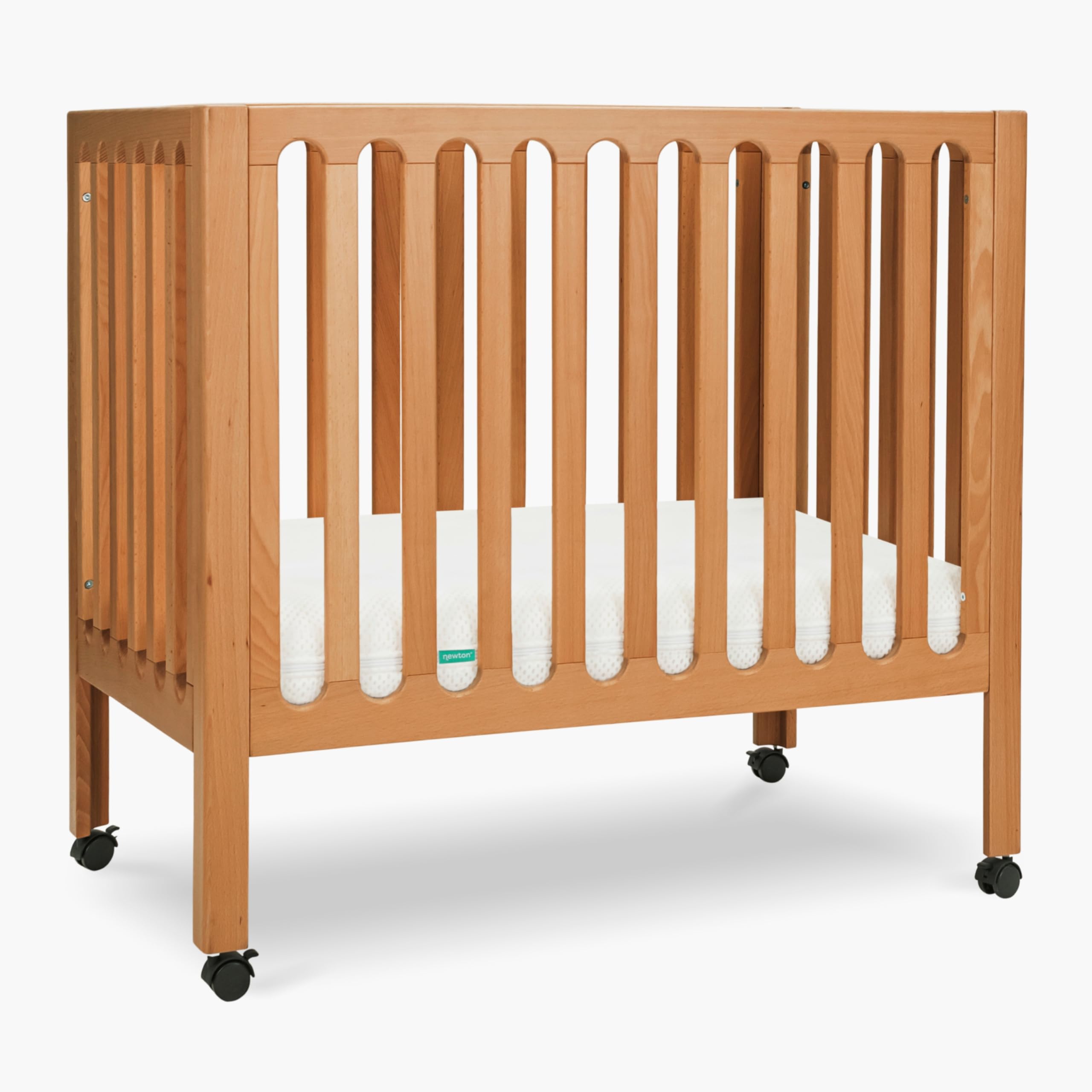 Newton Baby Galileo Mini Crib Solid Beech Wood with Wheels in Chestnut Color, Mini Crib Mattress Included, Adjustable Mattress Height, Ultra-Safe Non-Toxic Finish
