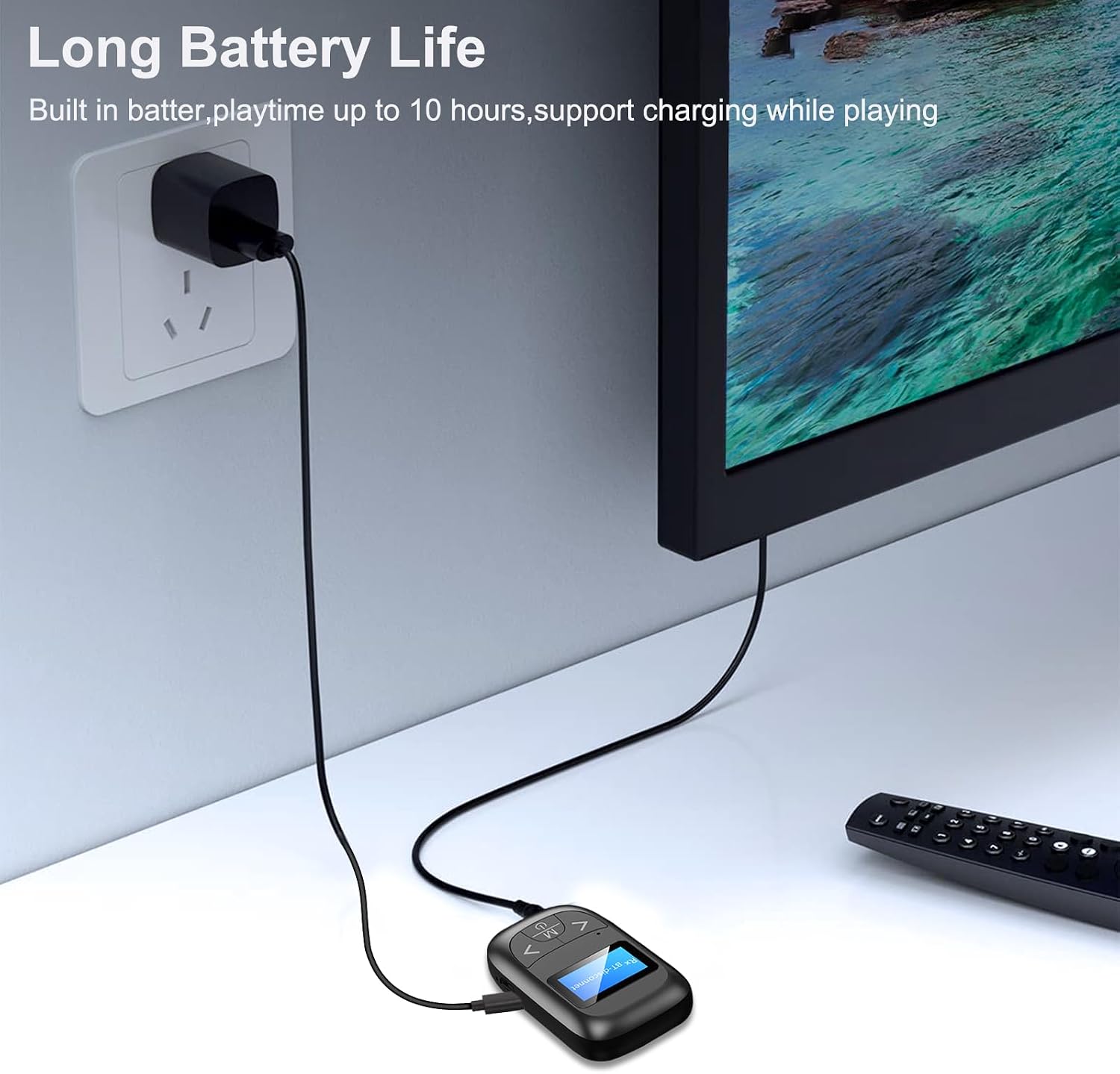 The Wodgreat T14 Bluetooth adapter connected to a power outlet via a USB cable, indicating its long battery life and ability to charge while in use.
