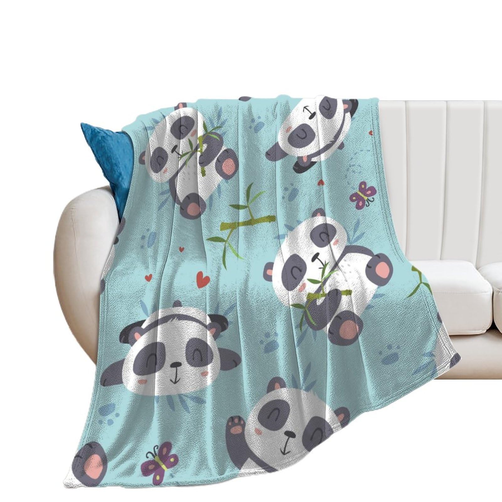 Couverture polaire panda douce pour vos soirées cocooning canapé