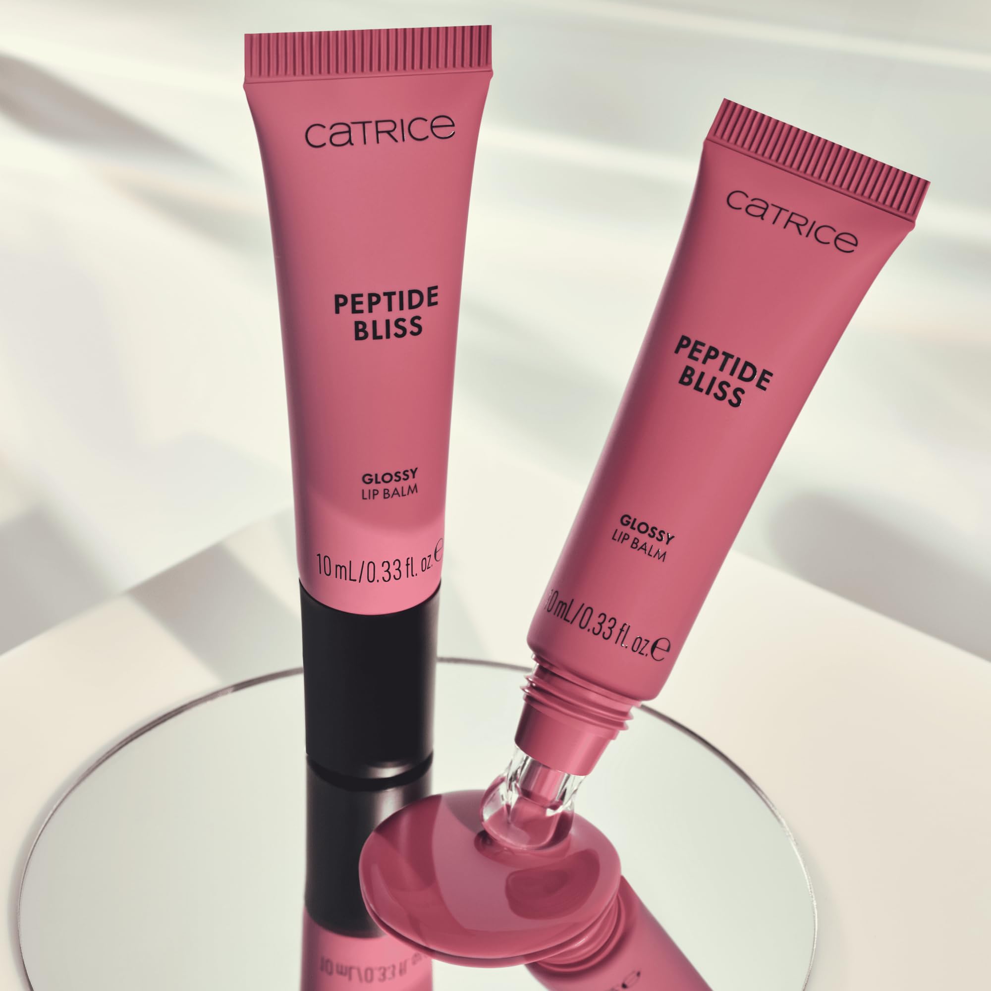 Catrice Lśniący balsam do ust Peptide Bliss Glosyy Lip Balm, nawilżanie, opieka, błyszczący, zroszony (10ml)