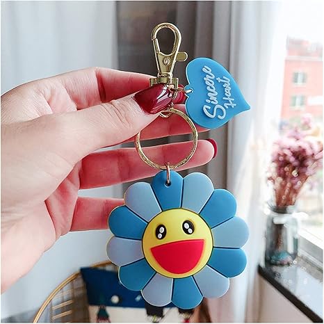 Amazon Co Jp かわいいキーホルダー 新しい豪華なひまわりキーホルダーかわいい太陽の花の車のキーチェーンの女性レディースバッグペンダントアクセサリーキーリングガールギフト Color Pvc 2 6 5cm ファッション