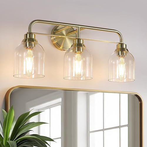 3 luces doradas claras para tocador de baño, lámparas de baño sobre espejo con pantalla de vidrio transparente, enchufes E26 de cerámica montados en