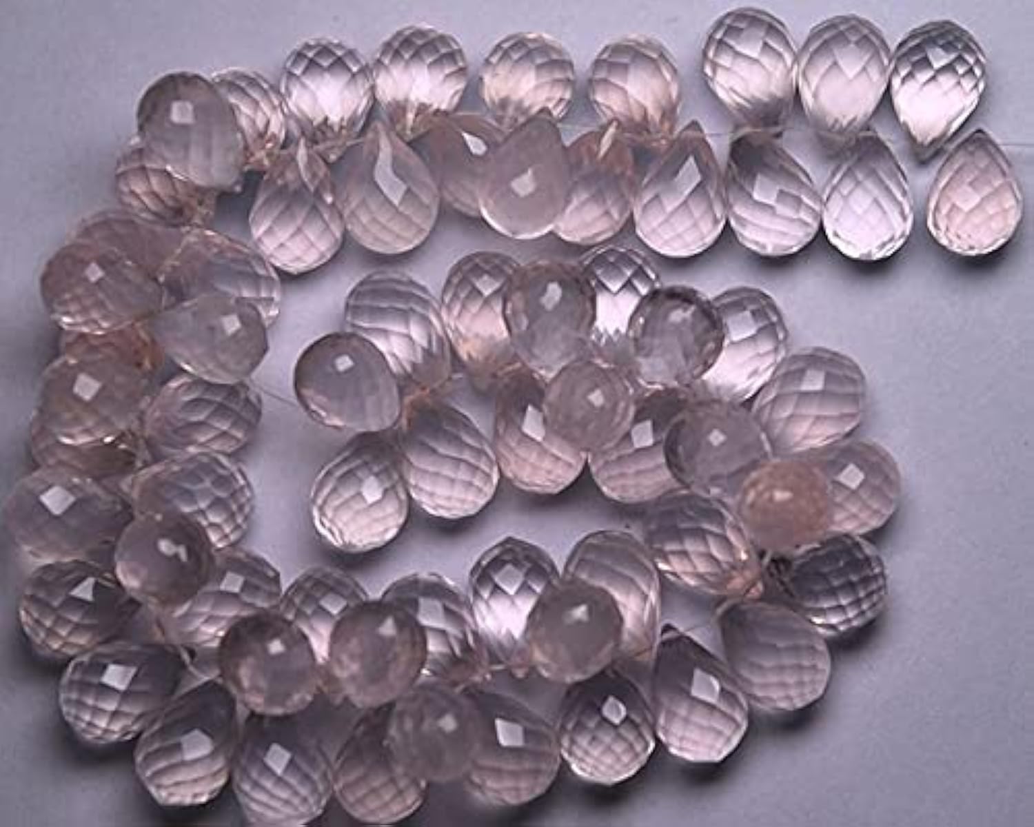 Briolettes quartz rose 7x10mm facettées et calibrées en forme de gouttes