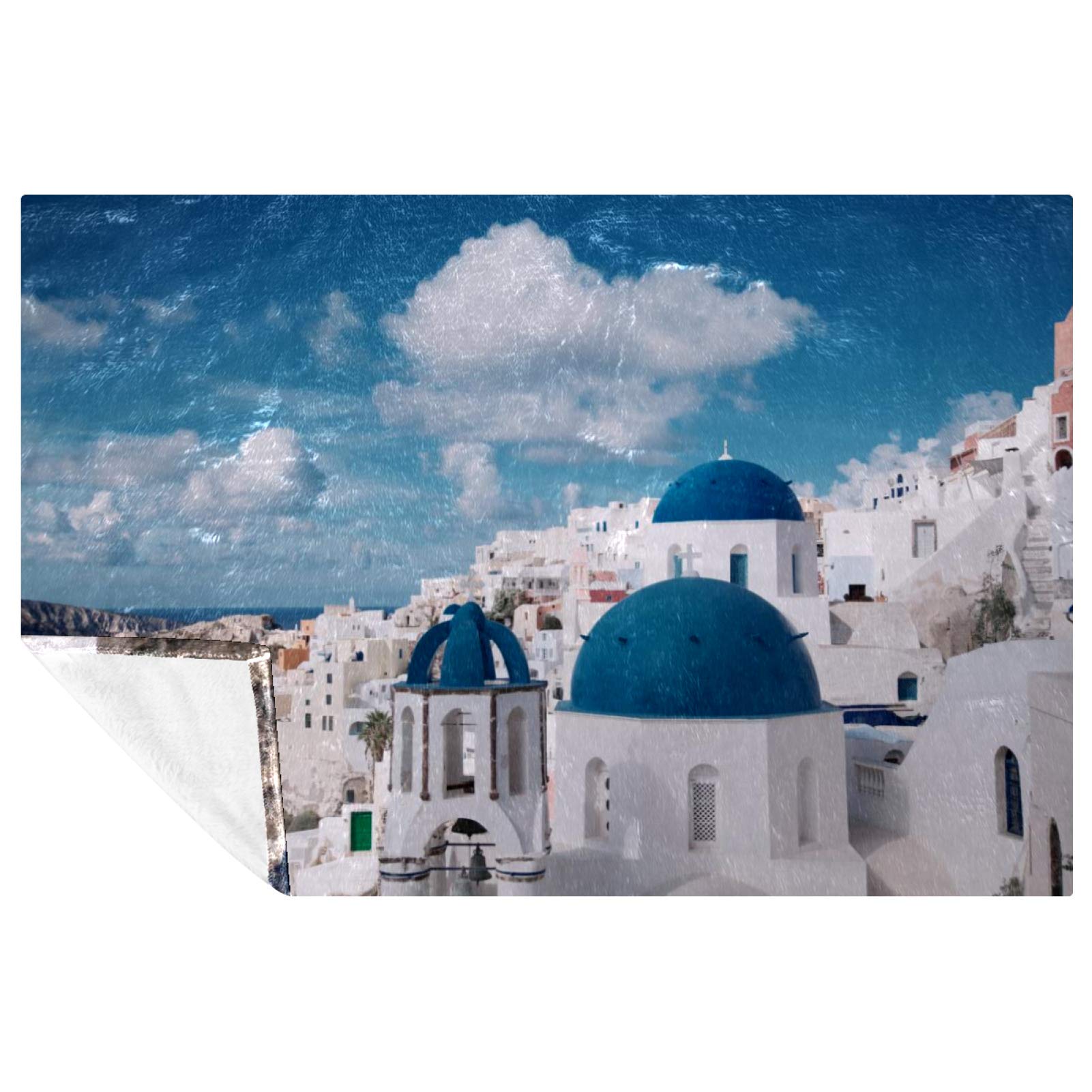 Couverture chaude Santorini pour ne plus avoir froid sur le canapé