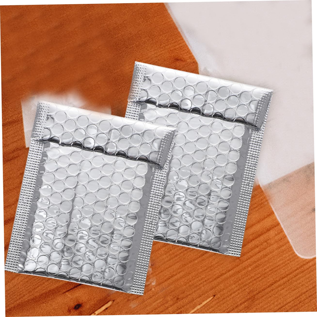 100 Stück Selbstklebende Gepolsterte Versandtaschen aus Silberner Aluminiumfolie Stoßfest Reißfest Sichere Luftpolster versandumschläge für Schutz von Elektronik und Empfindlichen