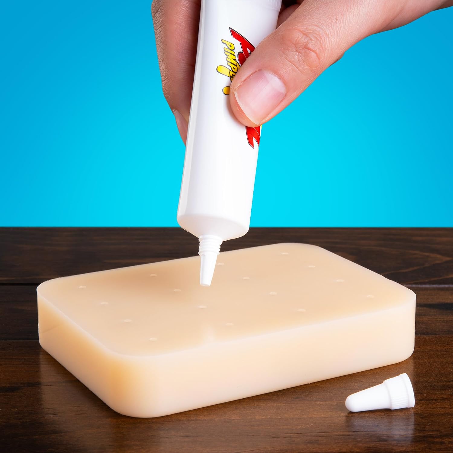 The Official Pimple Popping Toy with Refillable Pimple Pus | Featured on Shark Tank