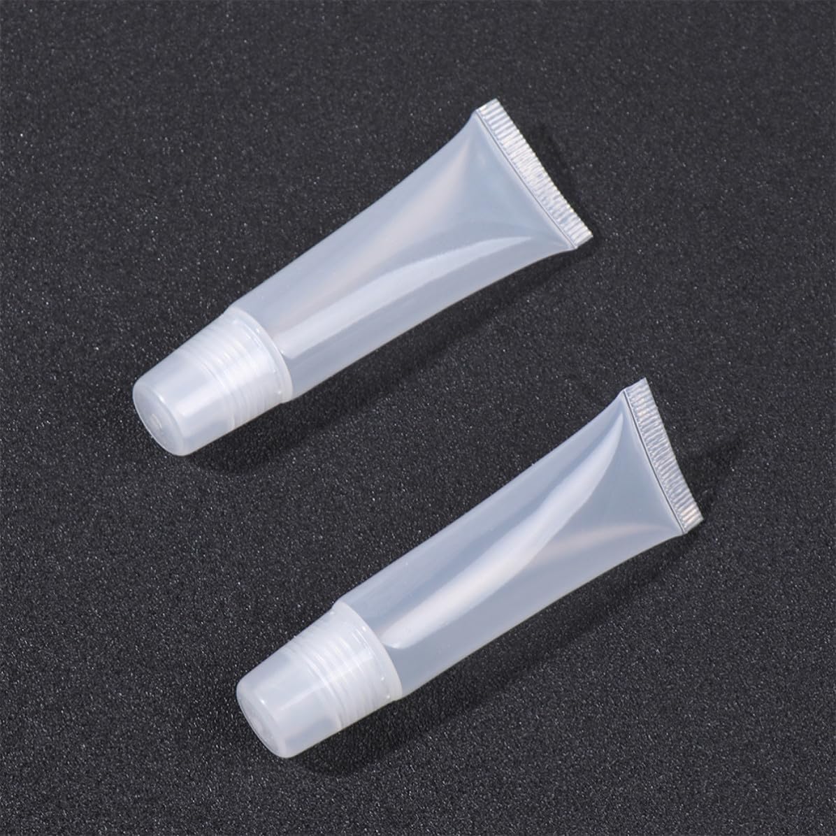 TEHAUX 80 Pcs Lip Balm Squeeze Bottles Cosmetic Dispensers with Leakproof Design Lightweight Pe and Pp Material Travel Empty Makeup Container