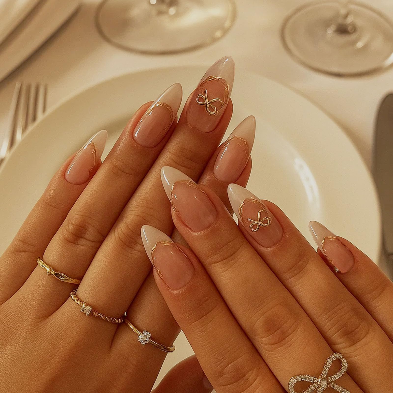 Almond Stiletto French Press-On Nails, Glossy Nude To White Gradient With Gold Bow & Line Detailing - Image 3
