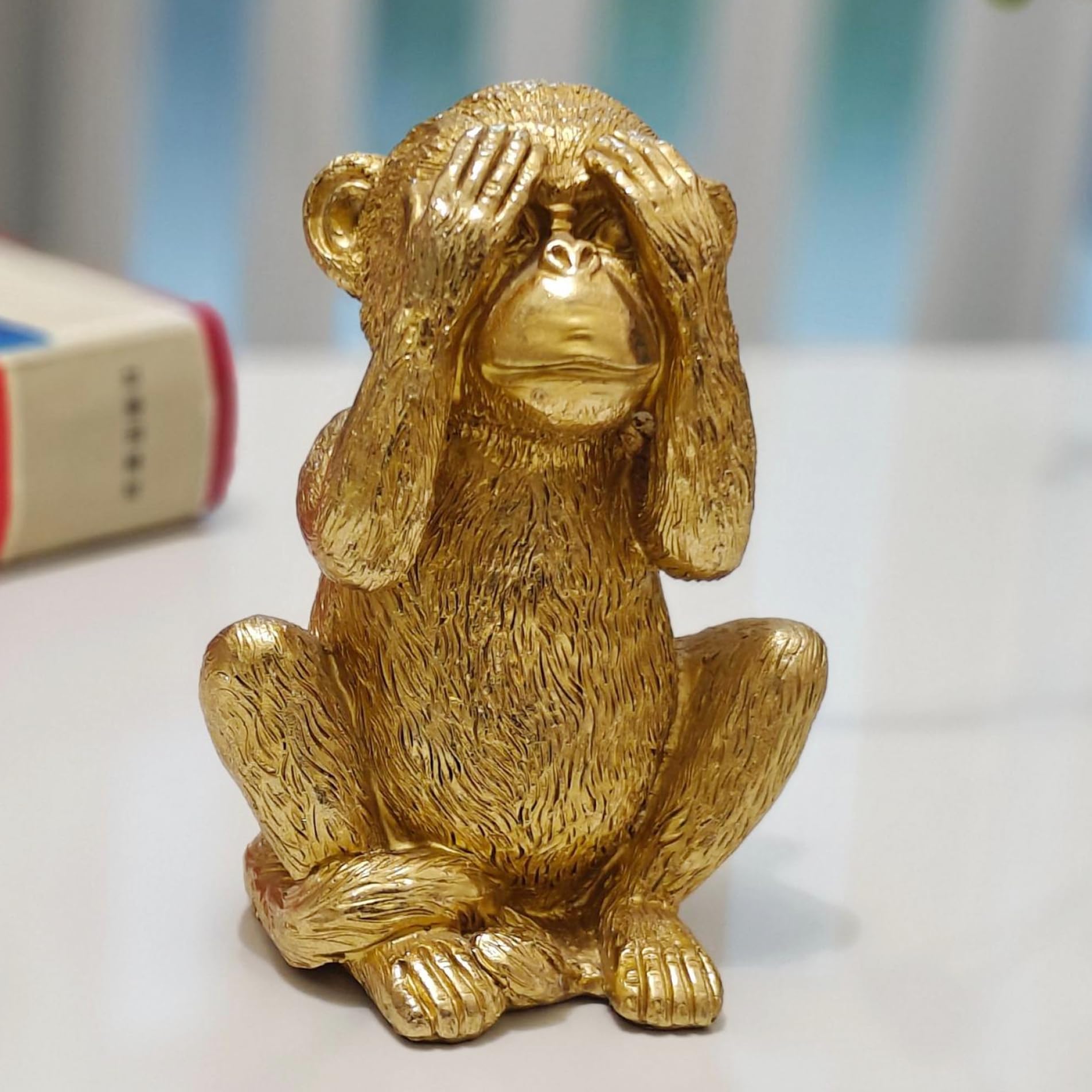 Figurine de singe dorée Gcroet, transformez votre bibliothèque ordinaire
