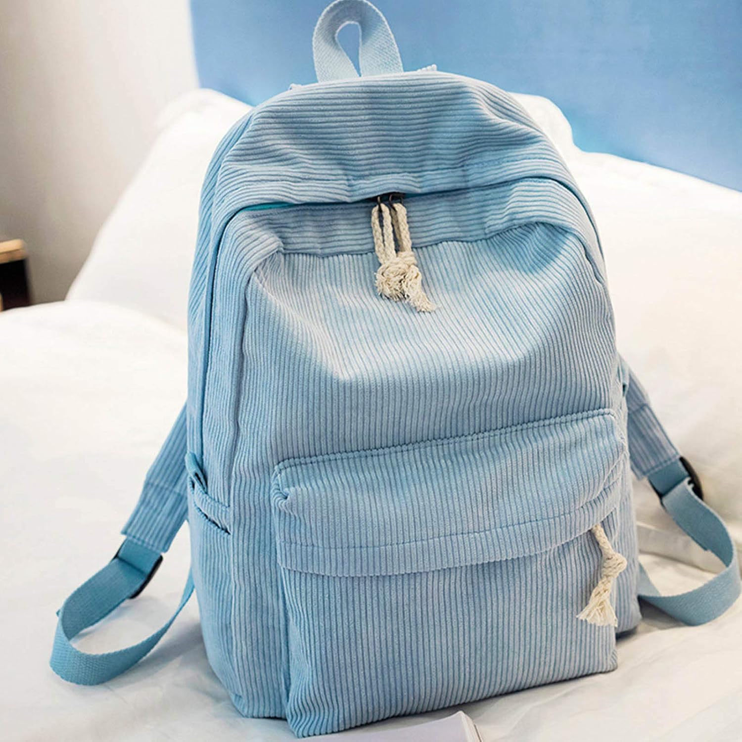 blue corduroy backpack